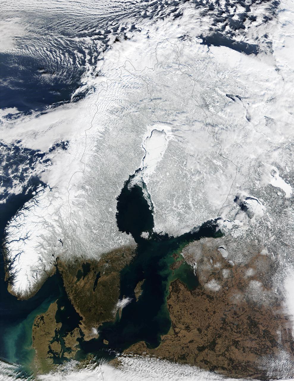 In this mostly cloud-free true-color scene, much of Scandinavia can be seen to be still covered by snow.  From left to right across the top of this image are the countries of Norway, Sweden, Finland, and northwestern Russia.    The Baltic Sea is located in the bottom center of this scene, with the Gulf of Bothnia to the north (in the center of this scene) and the Gulf of Finland to the northeast.  This image was acquired on March 15, 2002, by the  Moderate-resolution Imaging Spectroradiometer  (MODIS), flying aboard NASA's Terra  satellite.  Image courtesy Jacques Descloitres,  rapidfire.sci.gsfc.nasa.gov/ MODIS Land Rapid Response Team  at NASA GSFC  Credit: <b><a href="http://www.earthobservatory.nasa.gov/" rel="nofollow"> NASA Earth Observatory</a></b>  <b><a href="http://www.nasa.gov/audience/formedia/features/MP_Photo_Guidelines.html" rel="nofollow">NASA image use policy.</a></b>  <b><a href="http://www.nasa.gov/centers/goddard/home/index.html" rel="nofollow">NASA Goddard Space Flight Center</a></b> enables NASA’s mission through four scientific endeavors: Earth Science, Heliophysics, Solar System Exploration, and Astrophysics. Goddard plays a leading role in NASA’s accomplishments by contributing compelling scientific knowledge to advance the Agency’s mission.  <b>Follow us on <a href="http://twitter.com/NASAGoddardPix" rel="nofollow">Twitter</a></b>  <b>Like us on <a href="http://www.facebook.com/pages/Greenbelt-MD/NASA-Goddard/395013845897?ref=tsd" rel="nofollow">Facebook</a></b>  <b>Find us on <a href="http://instagram.com/nasagoddard?vm=grid" rel="nofollow">Instagram</a></b>