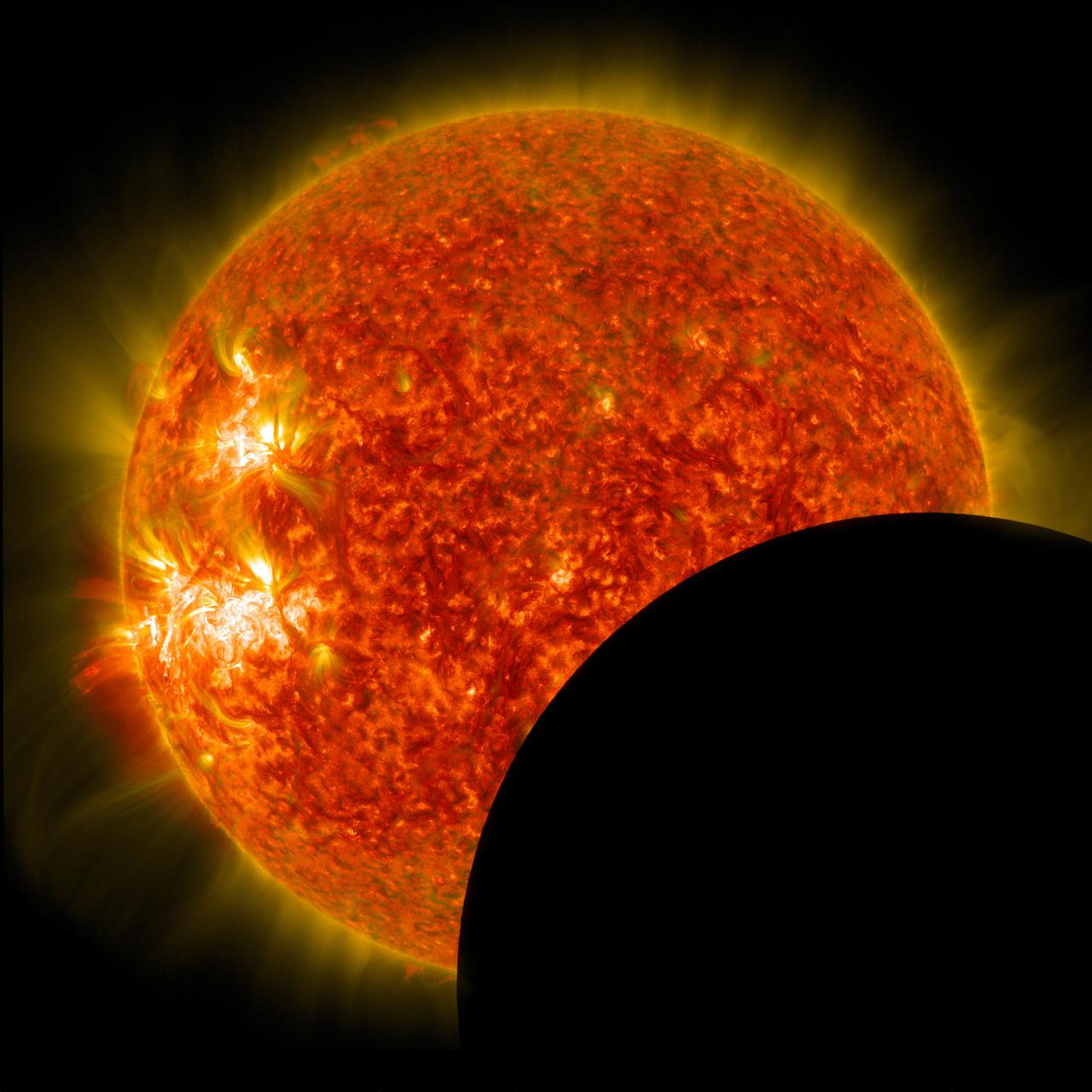 NASA's Solar Dynamics Observatory captured this image of the moon crossing in front of its view of the sun on Jan. 30, 2014, at 10:30 a.m. EST in 171 and 304 angstrom light. The two wavelengths are blended together.  Credit: NASA/SDO  <b><a href="http://www.nasa.gov/audience/formedia/features/MP_Photo_Guidelines.html" rel="nofollow">NASA image use policy.</a></b>  <b><a href="http://www.nasa.gov/centers/goddard/home/index.html" rel="nofollow">NASA Goddard Space Flight Center</a></b> enables NASA’s mission through four scientific endeavors: Earth Science, Heliophysics, Solar System Exploration, and Astrophysics. Goddard plays a leading role in NASA’s accomplishments by contributing compelling scientific knowledge to advance the Agency’s mission.  <b>Follow us on <a href="http://twitter.com/NASAGoddardPix" rel="nofollow">Twitter</a></b>  <b>Like us on <a href="http://www.facebook.com/pages/Greenbelt-MD/NASA-Goddard/395013845897?ref=tsd" rel="nofollow">Facebook</a></b>  <b>Find us on <a href="http://instagram.com/nasagoddard?vm=grid" rel="nofollow">Instagram</a></b>