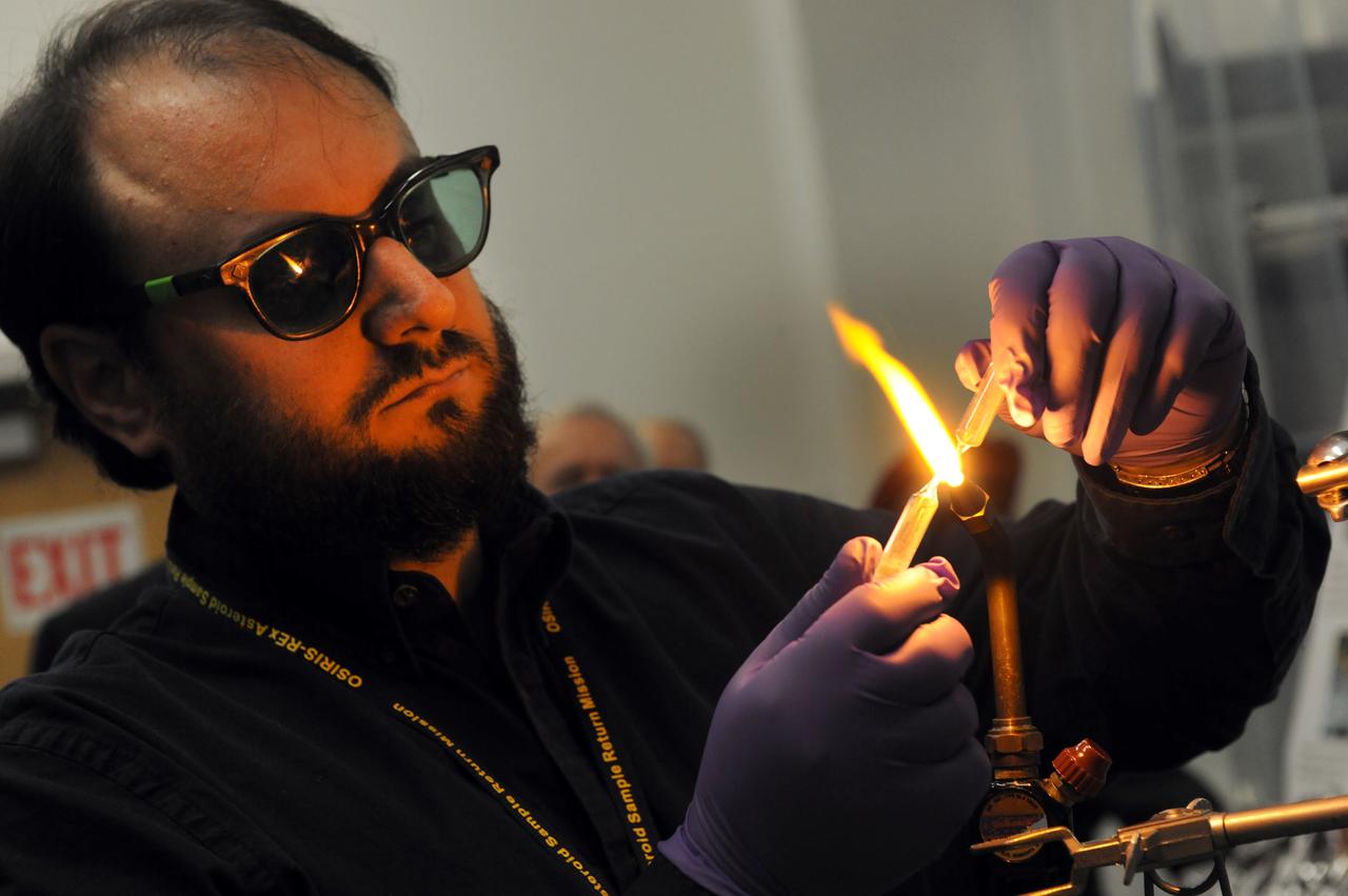 Dr. Jason Dworkin, Project Scientist for NASA's OSIRIS-Rex mission is seen hear sealing a glass test tube with a sample of Allende meteorite dust which is 4.567 BILLION years old. Jason is the Chief of NASA Goddard's Astrochemistry Lab. Read more about the mission here: <a href="http://www.nasa.gov/mission_pages/osiris-rex" rel="nofollow">www.nasa.gov/mission_pages/osiris-rex</a> Credit: NASA/Goddard/Debbie Mccallum <b><a href="http://www.nasa.gov/audience/formedia/features/MP_Photo_Guidelines.html" rel="nofollow">NASA image use policy.</a></b> <b><a href="http://www.nasa.gov/centers/goddard/home/index.html" rel="nofollow">NASA Goddard Space Flight Center</a></b> enables NASA’s mission through four scientific endeavors: Earth Science, Heliophysics, Solar System Exploration, and Astrophysics. Goddard plays a leading role in NASA’s accomplishments by contributing compelling scientific knowledge to advance the Agency’s mission. <b>Follow us on <a href="http://twitter.com/NASAGoddardPix" rel="nofollow">Twitter</a></b> <b>Like us on <a href="http://www.facebook.com/pages/Greenbelt-MD/NASA-Goddard/395013845897?ref=tsd" rel="nofollow">Facebook</a></b> <b>Find us on <a href="http://instagram.com/nasagoddard?vm=grid" rel="nofollow">Instagram</a></b>
