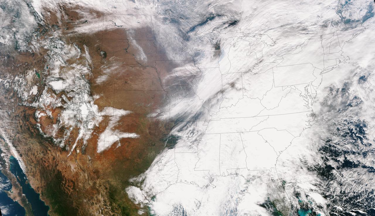 This true color image of the Continental United States was taken on Nov. 25, 2013 by the Suomi NPP satellite and shows the system as it moves through the South and Midwest.  The National Weather Service noted that a complex and powerful storm system continues to generate widespread moderate to heavy rainfall and snows in various parts of the eastern United States as travelers make their way to destinations to celebrate Thanksgiving and Hanukkah on Nov. 28. There are two low-pressure areas working together. One was centered near New Jersey while the other was located over the Carolinas.  From the Southeast to New England widespread moderate to heavy rainfall is expected. The rains will also affect the Mid-Atlantic and Southeastern United States, although those regions are not expected to get as much of a soaking.  The Appalachians and interior New England are expected to receive snowfall. Areas of heavy snow are forecast for northwestern Indiana and northwestern Pennsylvania on Nov. 27. Snows will blanket the north central United States from the Dakotas to Minnesota, Iowa, Wisconsin, Michigan, the Ohio and Tennessee Valleys, upstate New York and parts of northern New England.  The National Weather Service noted that cold air is moving in behind the storm and drop temperatures along the eastern U.S. making for a chilly Thanksgiving.   Credit: NASA/NOAA  <b><a href="http://www.nasa.gov/audience/formedia/features/MP_Photo_Guidelines.html" rel="nofollow">NASA image use policy.</a></b>  <b><a href="http://www.nasa.gov/centers/goddard/home/index.html" rel="nofollow">NASA Goddard Space Flight Center</a></b> enables NASA’s mission through four scientific endeavors: Earth Science, Heliophysics, Solar System Exploration, and Astrophysics. Goddard plays a leading role in NASA’s accomplishments by contributing compelling scientific knowledge to advance the Agency’s mission.  <b>Follow us on <a href="http://twitter.com/NASA_GoddardPix" rel="nofollow">Twitter</a></b>  <b>Like us on <a href="http://www.facebook.com/pages/Greenbelt-MD/NASA-Goddard/395013845897?ref=tsd" rel="nofollow">Facebook</a></b>  <b>Find us on <a href="http://instagram.com/nasagoddard?vm=grid" rel="nofollow">Instagram</a></b>