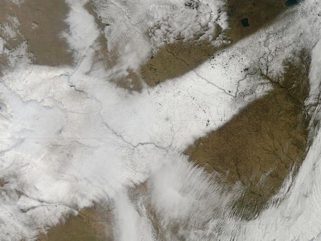 NASA image: Autumn snow across the Midwest
