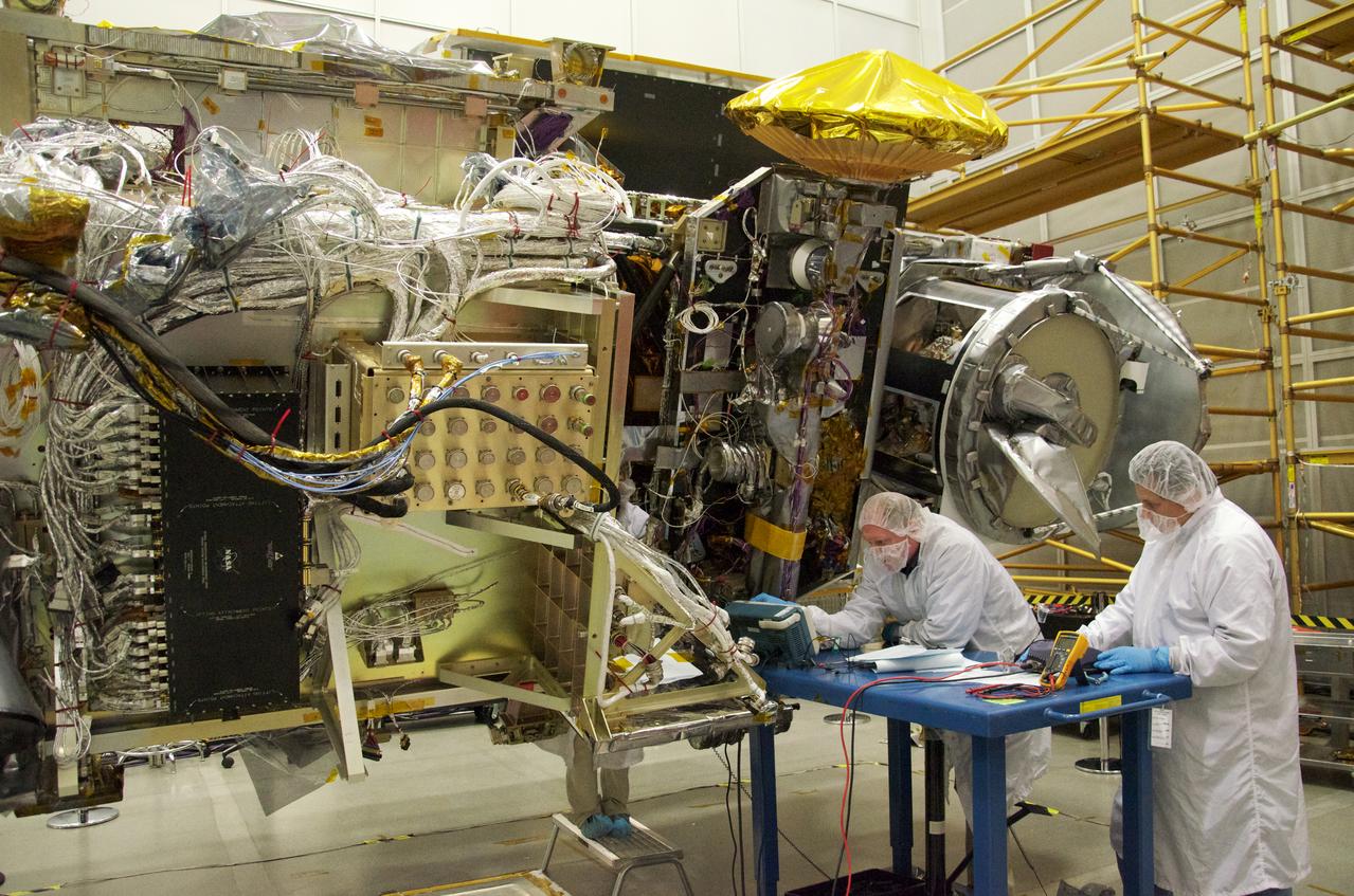 NASA engineers Rob Gallagher (left), Ken Smith (right) and Deneen Ferro (inside the spacecraft, center) work on the Global Precipitation Measurement mission's Core satellite in the clean room at Goddard Space Flight Center, Greenbelt Md. Credit: NASA/GSFC/Rebecca Roth The Global Precipitation Measurement (GPM) mission is an international partnership co-led by NASA and the Japan Aerospace Exploration Agency (JAXA) that will provide next-generation global observations of precipitation from space. GPM will study global rain, snow and ice to better understand our climate, weather, and hydrometeorological processes. As of Novermber 2013 the GPM Core Observatory is in the final stages of testing at NASA Goddard Space Flight Center. The satellite will be flown to Japan in the fall of 2013 and launched into orbit on an HII-A rocket in early 2014. For more on the GPM mission, visit <a href="http://gpm.gsfc.nasa.gov/" rel="nofollow">gpm.gsfc.nasa.gov/</a>. <b><a href="http://www.nasa.gov/audience/formedia/features/MP_Photo_Guidelines.html" rel="nofollow">NASA image use policy.</a></b> <b><a href="http://www.nasa.gov/centers/goddard/home/index.html" rel="nofollow">NASA Goddard Space Flight Center</a></b> enables NASA’s mission through four scientific endeavors: Earth Science, Heliophysics, Solar System Exploration, and Astrophysics. Goddard plays a leading role in NASA’s accomplishments by contributing compelling scientific knowledge to advance the Agency’s mission. <b>Follow us on <a href="http://twitter.com/NASA_GoddardPix" rel="nofollow">Twitter</a></b> <b>Like us on <a href="http://www.facebook.com/pages/Greenbelt-MD/NASA-Goddard/395013845897?ref=tsd" rel="nofollow">Facebook</a></b> <b>Find us on <a href="http://instagram.com/nasagoddard?vm=grid" rel="nofollow">Instagram</a></b>