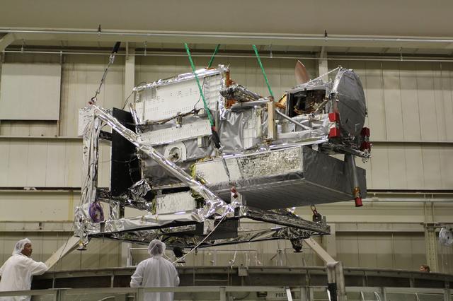 Engineers guiding the GPM Core Observatory into the thermal vacuum chamber.  Credit: NASA/Goddard   The Global Precipitation Measurement (GPM) mission is an international partnership co-led by NASA and the Japan Aerospace Exploration Agency (JAXA) that will provide next-generation global observations of precipitation from space.   GPM will study global rain, snow and ice to better understand our climate, weather, and hydrometeorological processes.   As of Novermber 2013 the GPM Core Observatory is in the final stages of testing at NASA Goddard Space Flight Center. The satellite will be flown to Japan in the fall of 2013 and launched into orbit on an HII-A rocket in early 2014.  For more on the GPM mission, visit <a href="http://gpm.gsfc.nasa.gov/" rel="nofollow">gpm.gsfc.nasa.gov/</a>.  <b><a href="http://www.nasa.gov/audience/formedia/features/MP_Photo_Guidelines.html" rel="nofollow">NASA image use policy.</a></b>  <b><a href="http://www.nasa.gov/centers/goddard/home/index.html" rel="nofollow">NASA Goddard Space Flight Center</a></b> enables NASA’s mission through four scientific endeavors: Earth Science, Heliophysics, Solar System Exploration, and Astrophysics. Goddard plays a leading role in NASA’s accomplishments by contributing compelling scientific knowledge to advance the Agency’s mission.  <b>Follow us on <a href="http://twitter.com/NASA_GoddardPix" rel="nofollow">Twitter</a></b>  <b>Like us on <a href="http://www.facebook.com/pages/Greenbelt-MD/NASA-Goddard/395013845897?ref=tsd" rel="nofollow">Facebook</a></b>  <b>Find us on <a href="http://instagram.com/nasagoddard?vm=grid" rel="nofollow">Instagram</a></b>