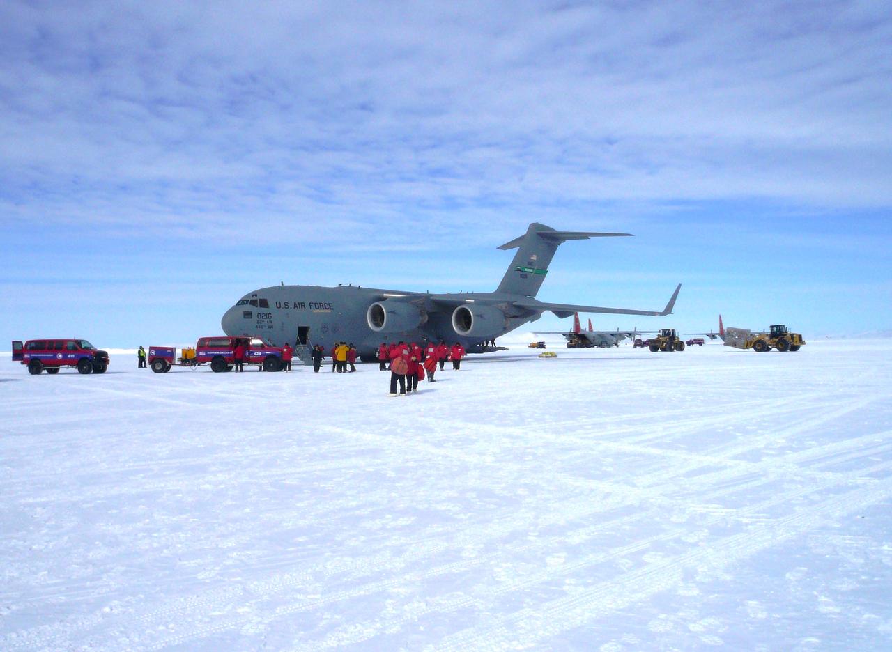 A U.S. Air Force C-17 transport aircraft sits on the sea ice runway at the National Science Foundation's McMurdo Station in Antarctica following a transit flight from Christchurch, New Zealand that transported IceBridge personnel and gear on Nov. 12, 2013.   The C-17 aircraft that fly to Antarctica are operated by the U.S. Air Force's 62nd and 446th Airlift Wings based at Joint Base Lewis-McChord near Seattle, Wash.    Credit: NASA/Goddard/George Hale  NASA's Operation IceBridge is an airborne science mission to study Earth's polar ice. For more information about IceBridge, visit: <a href="http://www.nasa.gov/icebridge" rel="nofollow">www.nasa.gov/icebridge</a>  <b><a href="http://www.nasa.gov/audience/formedia/features/MP_Photo_Guidelines.html" rel="nofollow">NASA image use policy.</a></b>  <b><a href="http://www.nasa.gov/centers/goddard/home/index.html" rel="nofollow">NASA Goddard Space Flight Center</a></b> enables NASA’s mission through four scientific endeavors: Earth Science, Heliophysics, Solar System Exploration, and Astrophysics. Goddard plays a leading role in NASA’s accomplishments by contributing compelling scientific knowledge to advance the Agency’s mission.  <b>Follow us on <a href="http://twitter.com/NASA_GoddardPix" rel="nofollow">Twitter</a></b>  <b>Like us on <a href="http://www.facebook.com/pages/Greenbelt-MD/NASA-Goddard/395013845897?ref=tsd" rel="nofollow">Facebook</a></b>  <b>Find us on <a href="http://instagram.com/nasagoddard?vm=grid" rel="nofollow">Instagram</a></b>
