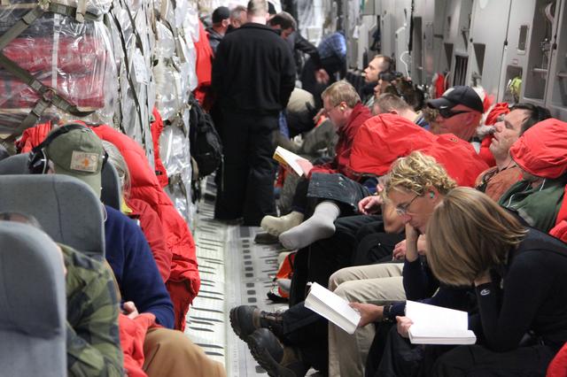 NASA image: C-17 passengers make use of transit time