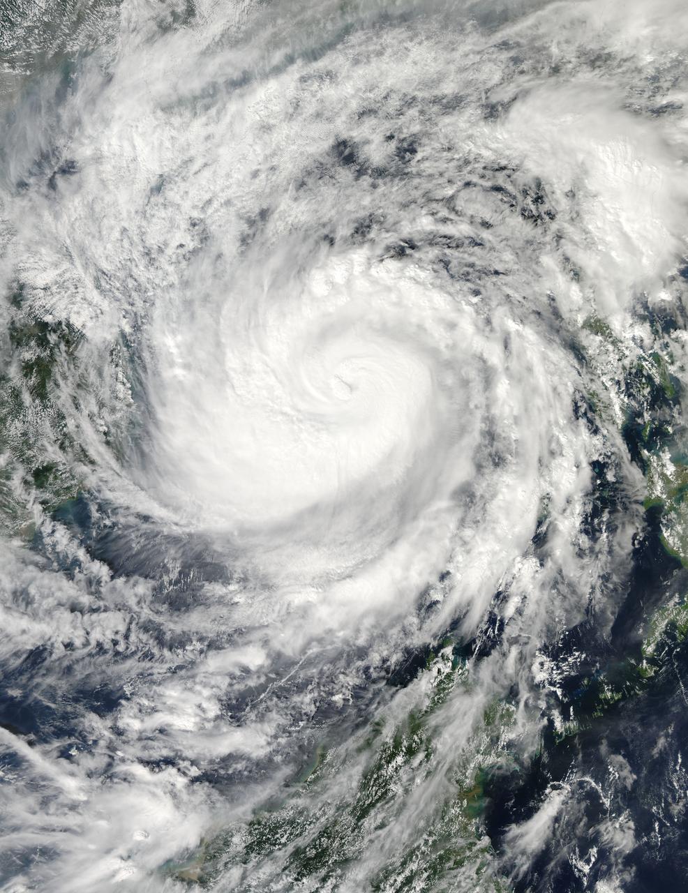 On Nov. 9 at 05:55 UTC/12:55 a.m. EDT, Typhoon Haiyan was in the middle of the South China Sea, headed toward Vietnam. Credit: NASA Goddard MODIS Rapid Response Team <b><a href="http://www.nasa.gov/audience/formedia/features/MP_Photo_Guidelines.html" rel="nofollow">NASA image use policy.</a></b> <b><a href="http://www.nasa.gov/centers/goddard/home/index.html" rel="nofollow">NASA Goddard Space Flight Center</a></b> enables NASA’s mission through four scientific endeavors: Earth Science, Heliophysics, Solar System Exploration, and Astrophysics. Goddard plays a leading role in NASA’s accomplishments by contributing compelling scientific knowledge to advance the Agency’s mission. <b>Follow us on <a href="http://twitter.com/NASA_GoddardPix" rel="nofollow">Twitter</a></b> <b>Like us on <a href="http://www.facebook.com/pages/Greenbelt-MD/NASA-Goddard/395013845897?ref=tsd" rel="nofollow">Facebook</a></b> <b>Find us on <a href="http://instagrid.me/nasagoddard/?vm=grid" rel="nofollow">Instagram</a></b>