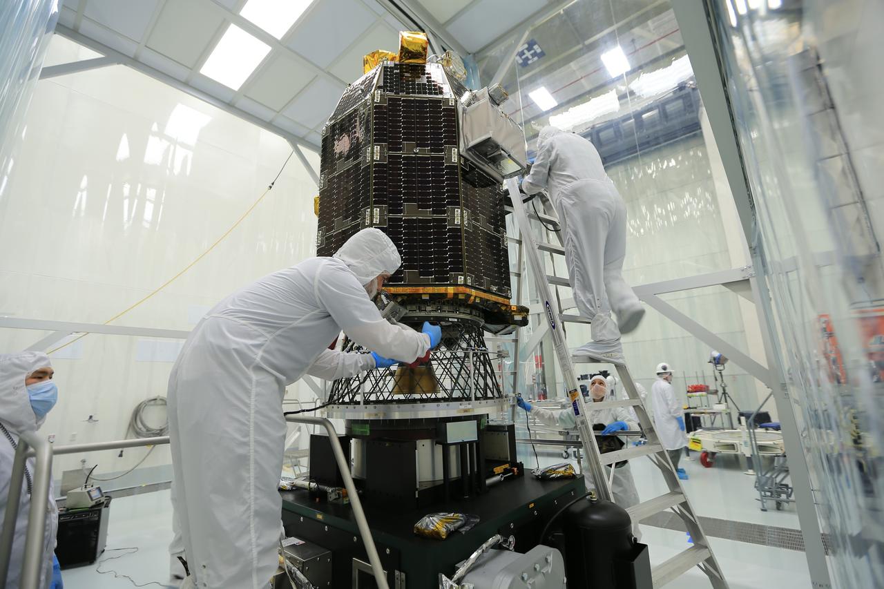 NASA's Lunar Atmosphere and Dust Environment Explorer (LADEE) spacecraft being prepared in the clean room at Wallops Flight Facility.  Credit: NASA  -----  What is LADEE? The Lunar Atmosphere and Dust Environment Explorer (LADEE) is designed to study the Moon's thin exosphere and the lunar dust environment. An &quot;exosphere&quot; is an atmosphere that is so thin and tenuous that molecules don't collide with each other. Studying the Moon's exosphere will help scientists understand other planetary bodies with exospheres too, like Mercury and some of Jupiter's bigger moons. The orbiter will determine the density, composition and temporal and spatial variability of the Moon's exosphere to help us understand where the species in the exosphere come from and the role of the solar wind, lunar surface and interior, and meteoric infall as sources. The mission will also examine the density and temporal and spatial variability of dust particles that may get lofted into the atmosphere. The mission also will test several new technologies, including a modular spacecraft bus that may reduce the cost of future deep space missions and demonstrate two-way high rate laser communication for the first time from the Moon.  LADEE now is ready to launch when the window opens on Sept. 6, 2013.  Read more: <a href="http://www.nasa.gov/ladee" rel="nofollow">www.nasa.gov/ladee</a> <b><a href="http://www.nasa.gov/audience/formedia/features/MP_Photo_Guidelines.html" rel="nofollow">NASA image use policy.</a></b>  <b><a href="http://www.nasa.gov/centers/goddard/home/index.html" rel="nofollow">NASA Goddard Space Flight Center</a></b> enables NASA’s mission through four scientific endeavors: Earth Science, Heliophysics, Solar System Exploration, and Astrophysics. Goddard plays a leading role in NASA’s accomplishments by contributing compelling scientific knowledge to advance the Agency’s mission.  <b>Follow us on <a href="http://twitter.com/NASA_GoddardPix" rel="nofollow">Twitter</a></b>  <b>Like us on <a href="http://www.facebook.com/pages/Greenbelt-MD/NASA-Goddard/395013845897?ref=tsd" rel="nofollow">Facebook</a></b>  <b>Find us on <a href="http://instagram.com/nasagoddard?vm=grid" rel="nofollow">Instagram</a></b>