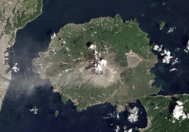 Although Japan’s Sakura-jima volcano is one of the most active in the world, it rarely makes headlines. One or two small explosions typically occur every few days, with effects no greater than a light dusting of ash on the surrounding cities. On August 18, 2013, a large eruption sent ash 20,000 feet (6,000 meters) above Kagoshima Bay, breaking the established pattern. It was possibly the largest eruption ever from the Showa Crater, which formed in 1946.  NASA Earth Observatory images by Jesse Allen and Robert Simmon, using Landsat 8 data from the USGS Earth Explorer. Caption by Robert Simmon.  Instrument:  Landsat 8 - OLI  More details: <a href="http://1.usa.gov/19WQpBQ" rel="nofollow">1.usa.gov/19WQpBQ</a>  <b><a href="http://www.nasa.gov/audience/formedia/features/MP_Photo_Guidelines.html" rel="nofollow">NASA image use policy.</a></b>  <b><a href="http://www.nasa.gov/centers/goddard/home/index.html" rel="nofollow">NASA Goddard Space Flight Center</a></b> enables NASA’s mission through four scientific endeavors: Earth Science, Heliophysics, Solar System Exploration, and Astrophysics. Goddard plays a leading role in NASA’s accomplishments by contributing compelling scientific knowledge to advance the Agency’s mission.  <b>Follow us on <a href="http://twitter.com/NASA_GoddardPix" rel="nofollow">Twitter</a></b>  <b>Like us on <a href="http://www.facebook.com/pages/Greenbelt-MD/NASA-Goddard/395013845897?ref=tsd" rel="nofollow">Facebook</a></b>  <b>Find us on <a href="http://instagram.com/nasagoddard?vm=grid" rel="nofollow">Instagram</a></b>