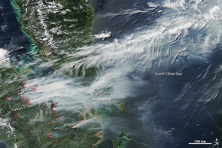 On June 19, 2013, NASA’s Aqua satellite captured a striking image of smoke billowing from illegal wildfires on the Indonesian island of Sumatra. The smoke blew east toward southern Malaysia and Singapore, and news media reported that thick clouds of haze had descended on Singapore, pushing pollution levels to record levels.  Singapore’s primary measure of pollution, the Pollutant Standards Index (PSI)—a uniform measure of key pollutants similar to the Air Quality Index (AQI) used by the U.S. Environmental Protection Agency—spiked to 371 on the afternoon of June 20, 2013, the highest level ever recorded. The previous record occurred in 1997, when the index hit 226. Health experts consider any level above 300 to be “hazardous” to human health. Levels above 200 are considered “very unhealthy.”  The image above was captured by the Moderate Resolution Imaging Spectroradiometer (MODIS), an instrument that observes the entire surface of Earth’s every 1 to 2 days. The  image was captured during the afternoon at 6:30 UTC (2:30 p.m. local time).  Though local laws prohibit it, farmers in Sumatra often burn forests during the dry season to prepare soil for new crops. The BBC reported that Singapore’s Prime Minister Lee Hsien Loong warned that the haze could “easily last for several weeks and quite possibly longer until the dry season ends in Sumatra.”  NASA image by Jeff Schmaltz, LANCE/EOSDIS Rapid Response. Caption by Adam Voiland.  Credit: <b><a href="http://www.earthobservatory.nasa.gov/" rel="nofollow"> NASA Earth Observatory</a></b>  Instrument: Aqua - MODIS  <b><a href="http://www.nasa.gov/audience/formedia/features/MP_Photo_Guidelines.html" rel="nofollow">NASA image use policy.</a></b>  <b><a href="http://www.nasa.gov/centers/goddard/home/index.html" rel="nofollow">NASA Goddard Space Flight Center</a></b> enables NASA’s mission through four scientific endeavors: Earth Science, Heliophysics, Solar System Exploration, and Astrophysics. Goddard plays a leading role in NASA’s accomplishments by contributing compelling scientific knowledge to advance the Agency’s mission.  <b>Follow us on <a href="http://twitter.com/NASA_GoddardPix" rel="nofollow">Twitter</a></b>  <b>Like us on <a href="http://www.facebook.com/pages/Greenbelt-MD/NASA-Goddard/395013845897?ref=tsd" rel="nofollow">Facebook</a></b>  <b>Find us on <a href="http://instagram.com/nasagoddard?vm=grid" rel="nofollow">Instagram</a></b>