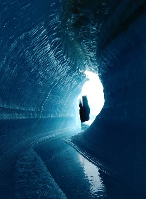 This ice cave in Belcher Glacier (Devon Island, Canada) was formed by melt water flowing within the glacier ice. To learn about the contributions of glaciers to sea level rise, visit: <a href="http://www.nasa.gov/topics/earth/features/glacier-sea-rise.html" rel="nofollow">www.nasa.gov/topics/earth/features/glacier-sea-rise.html</a> Credit: Angus Duncan, University of Saskatchewan <b><a href="http://www.nasa.gov/audience/formedia/features/MP_Photo_Guidelines.html" rel="nofollow">NASA image use policy.</a></b> <b><a href="http://www.nasa.gov/centers/goddard/home/index.html" rel="nofollow">NASA Goddard Space Flight Center</a></b> enables NASA’s mission through four scientific endeavors: Earth Science, Heliophysics, Solar System Exploration, and Astrophysics. Goddard plays a leading role in NASA’s accomplishments by contributing compelling scientific knowledge to advance the Agency’s mission. <b>Follow us on <a href="http://twitter.com/NASA_GoddardPix" rel="nofollow">Twitter</a></b> <b>Like us on <a href="http://www.facebook.com/pages/Greenbelt-MD/NASA-Goddard/395013845897?ref=tsd" rel="nofollow">Facebook</a></b> <b>Find us on <a href="http://instagram.com/nasagoddard?vm=grid" rel="nofollow">Instagram</a></b>