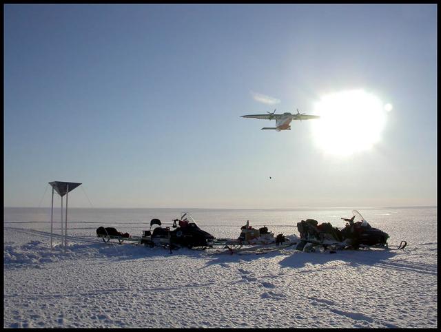 An airplane drops essential support on the Austfonna Ice Cap in Svalbard (Norwegian Arctic). The triangular structure is a corner reflector used as ground reference for airborne radar surveys. To learn about the contributions of glaciers to sea level rise, visit: <a href="http://www.nasa.gov/topics/earth/features/glacier-sea-rise.html" rel="nofollow">www.nasa.gov/topics/earth/features/glacier-sea-rise.html</a> Credit: Andrea Taurisano, Norwegian Polar Institute <b><a href="http://www.nasa.gov/audience/formedia/features/MP_Photo_Guidelines.html" rel="nofollow">NASA image use policy.</a></b> <b><a href="http://www.nasa.gov/centers/goddard/home/index.html" rel="nofollow">NASA Goddard Space Flight Center</a></b> enables NASA’s mission through four scientific endeavors: Earth Science, Heliophysics, Solar System Exploration, and Astrophysics. Goddard plays a leading role in NASA’s accomplishments by contributing compelling scientific knowledge to advance the Agency’s mission. <b>Follow us on <a href="http://twitter.com/NASA_GoddardPix" rel="nofollow">Twitter</a></b> <b>Like us on <a href="http://www.facebook.com/pages/Greenbelt-MD/NASA-Goddard/395013845897?ref=tsd" rel="nofollow">Facebook</a></b> <b>Find us on <a href="http://instagram.com/nasagoddard?vm=grid" rel="nofollow">Instagram</a></b>