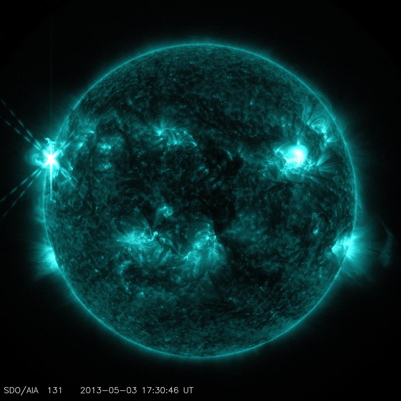 Caption: NASA’s Solar Dynamics Observatory (SDO) captured this image of an M5.7 class flare on May 3, 2013 at 1:30 p.m. EDT. This image shows light in the 131 Angstrom wavelength, a wavelength of light that can show material at the very hot temperatures of a solar flare and that is typically colorized in teal.  Caption: NASA’s Solar Dynamics Observatory (SDO) captured this image of an M5.7 class flare on May 3, 2013 at 1:30 p.m. EDT. This image shows light in the 131 Angstrom wavelength, a wavelength of light that can show material at the very hot temperatures of a solar flare and that is typically colorized in teal.   Credit: NASA/Goddard/SDO  ---  The sun emitted a mid-level solar flare, peaking at 1:32 pm EDT on May 3, 2013. Solar flares are powerful bursts of radiation. Harmful radiation from a flare cannot pass through Earth's atmosphere to physically affect humans on the ground, however -- when intense enough -- they can disturb the atmosphere in the layer where GPS and communications signals travel. This disrupts the radio signals for as long as the flare is ongoing, and the radio blackout for this flare has already subsided.    This flare is classified as an M5.7 class flare. M-class flares are the weakest flares that can still cause some space weather effects near Earth. Increased numbers of flares are quite common at the moment, since the sun's normal 11-year activity cycle is ramping up toward solar maximum, which is expected in late 2013.   Updates will be provided as they are available on the flare and whether there was an associated coronal mass ejection (CME), another solar phenomenon that can send solar particles into space and affect electronic systems in satellites and on Earth.   <b><a href="http://www.nasa.gov/audience/formedia/features/MP_Photo_Guidelines.html" rel="nofollow">NASA image use policy.</a></b>  <b><a href="http://www.nasa.gov/centers/goddard/home/index.html" rel="nofollow">NASA Goddard Space Flight Center</a></b> enables NASA’s mission through four scientific endeavors: Earth Science, Heliophysics, Solar System Exploration, and Astrophysics. Goddard plays a leading role in NASA’s accomplishments by contributing compelling scientific knowledge to advance the Agency’s mission.  <b>Follow us on <a href="http://twitter.com/NASA_GoddardPix" rel="nofollow">Twitter</a></b>  <b>Like us on <a href="http://www.facebook.com/pages/Greenbelt-MD/NASA-Goddard/395013845897?ref=tsd" rel="nofollow">Facebook</a></b>  <b>Find us on <a href="http://instagram.com/nasagoddard?vm=grid" rel="nofollow">Instagram</a></b>