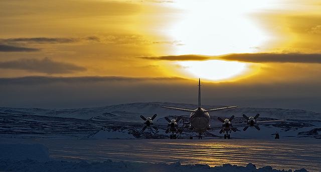 The P-3B is waiting outside the hangar at Thule Air Base with the Greenland Ice sheet in the background. Today, NASA's IceBridge, Arctic 2013 mission will collect data across the Arctic Ocean between Greenland and Alaska.   -- IceBridge, a six-year NASA mission, is the largest airborne survey of Earth's polar ice ever flown. It will yield an unprecedented three-dimensional view of Arctic and Antarctic ice sheets, ice shelves and sea ice. These flights will provide a yearly, multi-instrument look at the behavior of the rapidly changing features of the Greenland and Antarctic ice.  Data collected during IceBridge will help scientists bridge the gap in polar observations between NASA's Ice, Cloud and Land Elevation Satellite (ICESat) -- in orbit since 2003 -- and ICESat-2, planned for early 2016. ICESat stopped collecting science data in 2009, making IceBridge critical for ensuring a continuous series of observations.  IceBridge will use airborne instruments to map Arctic and Antarctic areas once a year. IceBridge flights are conducted in March-May over Greenland and in October-November over Antarctica. Other smaller airborne surveys around the world are also part of the IceBridge campaign.  Credit: NASA/Goddard/Michael Studinger  <b><a href="http://www.nasa.gov/audience/formedia/features/MP_Photo_Guidelines.html" rel="nofollow">NASA image use policy.</a></b>  <b><a href="http://www.nasa.gov/centers/goddard/home/index.html" rel="nofollow">NASA Goddard Space Flight Center</a></b> enables NASA’s mission through four scientific endeavors: Earth Science, Heliophysics, Solar System Exploration, and Astrophysics. Goddard plays a leading role in NASA’s accomplishments by contributing compelling scientific knowledge to advance the Agency’s mission.  <b>Follow us on <a href="http://twitter.com/NASA_GoddardPix" rel="nofollow">Twitter</a></b>  <b>Like us on <a href="http://www.facebook.com/pages/Greenbelt-MD/NASA-Goddard/395013845897?ref=tsd" rel="nofollow">Facebook</a></b>  <b>Find us on <a href="http://instagram.com/nasagoddard?vm=grid" rel="nofollow">Instagram</a></b>