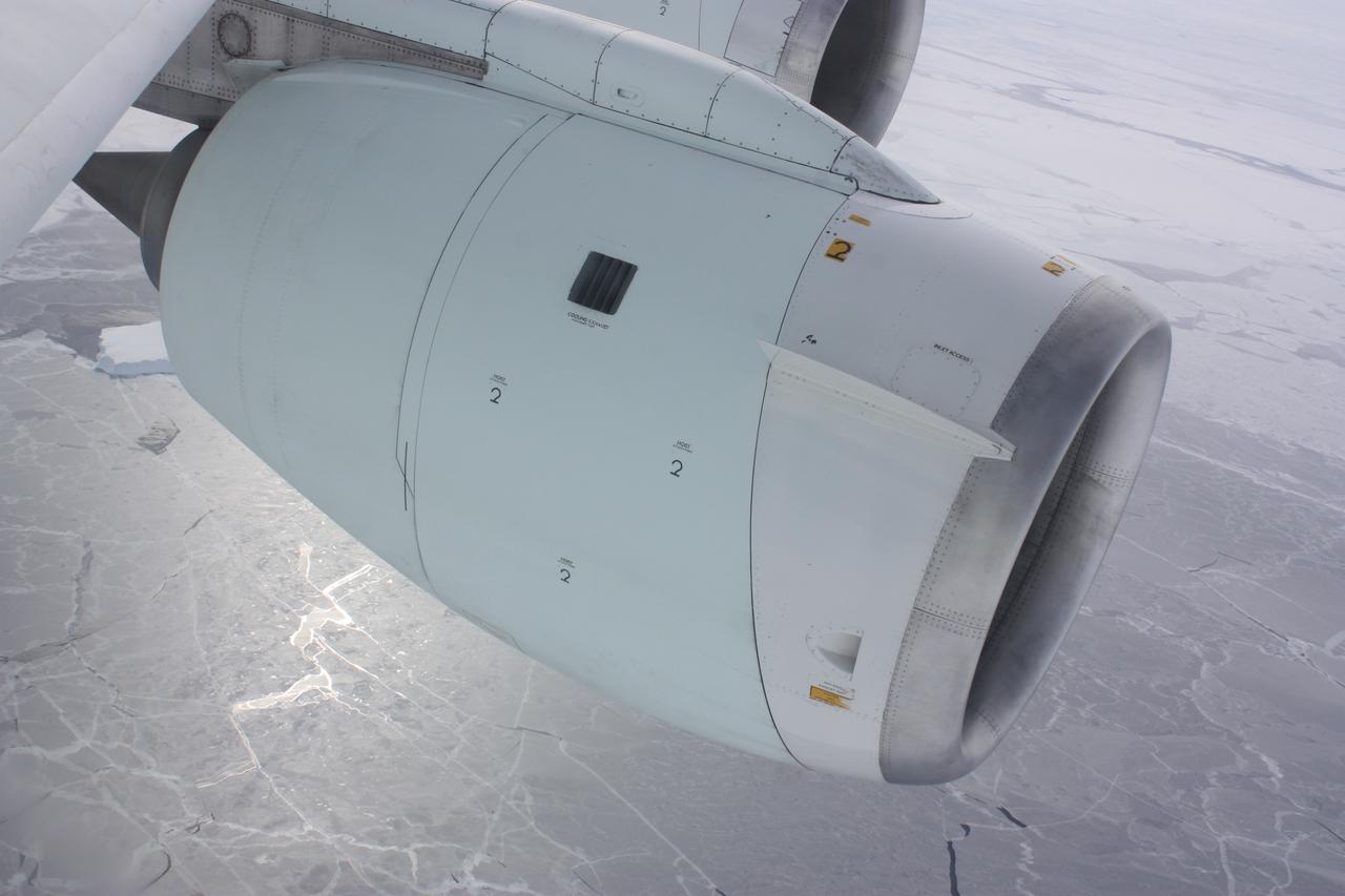 One of the engines of NASA's DC-8 airborne laboratory above sea ice in the Bellingshausen Sea on Oct. 19, 2012.   Credit: NASA / George Hale  NASA's Operation IceBridge is an airborne science mission to study Earth's polar ice. For more information about IceBridge, visit: <a href="http://www.nasa.gov/icebridge" rel="nofollow">www.nasa.gov/icebridge</a>  <b><a href="http://www.nasa.gov/audience/formedia/features/MP_Photo_Guidelines.html" rel="nofollow">NASA image use policy.</a></b>  <b><a href="http://www.nasa.gov/centers/goddard/home/index.html" rel="nofollow">NASA Goddard Space Flight Center</a></b> enables NASA’s mission through four scientific endeavors: Earth Science, Heliophysics, Solar System Exploration, and Astrophysics. Goddard plays a leading role in NASA’s accomplishments by contributing compelling scientific knowledge to advance the Agency’s mission.  <b>Follow us on <a href="http://twitter.com/NASA_GoddardPix" rel="nofollow">Twitter</a></b>  <b>Like us on <a href="http://www.facebook.com/pages/Greenbelt-MD/NASA-Goddard/395013845897?ref=tsd" rel="nofollow">Facebook</a></b>  <b>Find us on <a href="http://instagrid.me/nasagoddard/?vm=grid" rel="nofollow">Instagram</a></b>