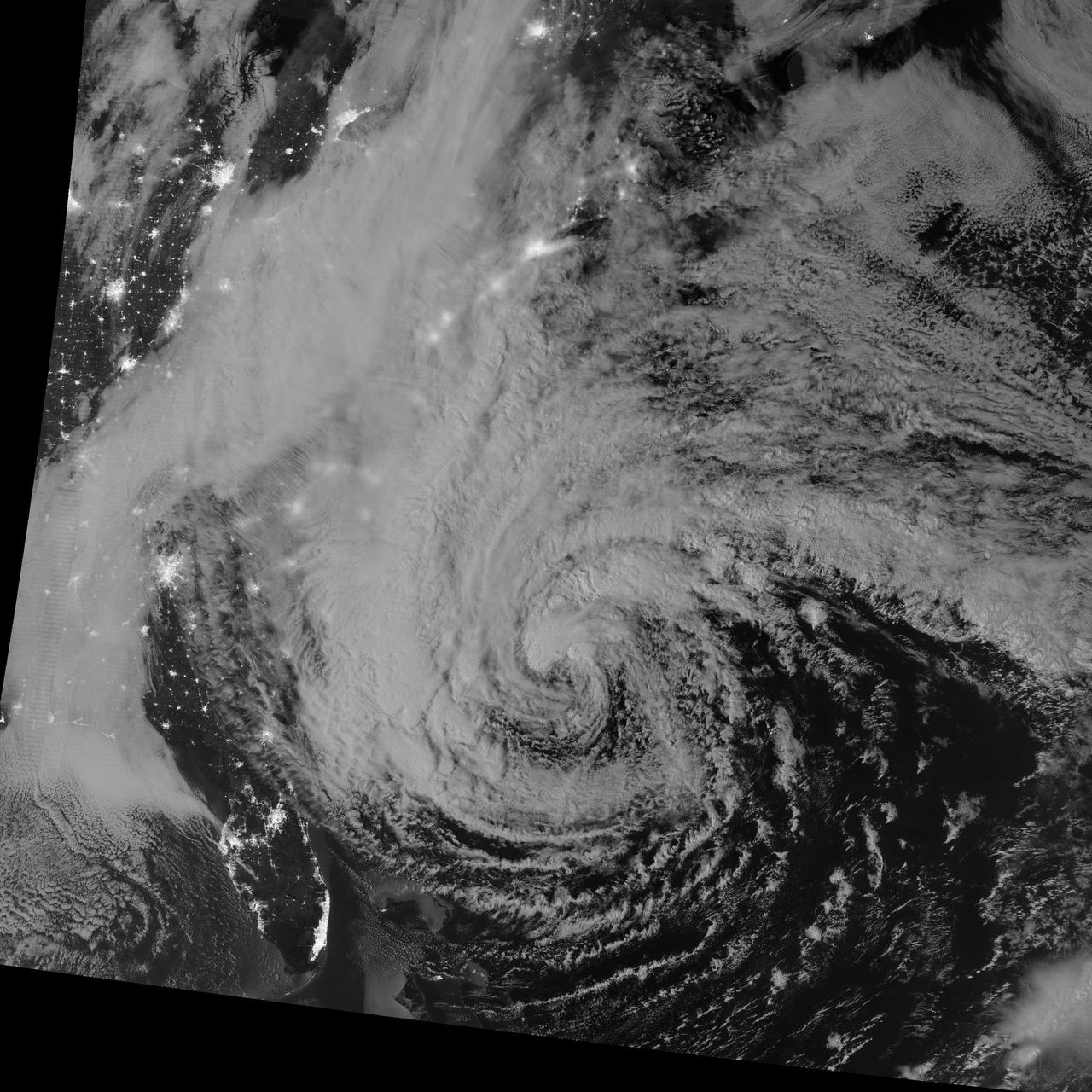 NASA image acquired October 28, 2012 <b>For the latest info from NASA on Hurricane Sandy go to: <a href="http://1.usa.gov/Ti5SgS" rel="nofollow">1.usa.gov/Ti5SgS</a></b> This image of Hurricane Sandy was acquired by the Visible Infrared Imaging Radiometer Suite (VIIRS) on the Suomi NPP satellite around 2:42 a.m. Eastern Daylight Time (06:42 Universal Time) on October 28, 2012. The storm was captured by a special “day-night band,” which detects light in a range of wavelengths from green to near-infrared and uses filtering techniques to observe dim signals such as auroras, airglow, gas flares, city lights, and reflected moonlight. In this case, the cloud tops were lit by the nearly full Moon (full occurs on October 29). Some city lights in Florida and Georgia are also visible amidst the clouds. The Suomi NPP satellite was launched one year ago today (on October 28, 2011) to extend and enhance long-term records of key environmental data monitored by NASA, the National Oceanic and Atmospheric Administration (NOAA), and the U.S. Department of Defense. NASA Earth Observatory image by Jesse Allen and Robert Simmon, using VIIRS Day-Night Band data from the Suomi National Polar-orbiting Partnership (Suomi NPP). Suomi NPP is the result of a partnership between NASA, the National Oceanic and Atmospheric Administration, and the Department of Defense. Caption by Michael Carlowicz. Instrument: Suomi NPP - VIIRS <b><a href="http://www.nasa.gov/audience/formedia/features/MP_Photo_Guidelines.html" rel="nofollow">NASA image use policy.</a></b> <b><a href="http://www.nasa.gov/centers/goddard/home/index.html" rel="nofollow">NASA Goddard Space Flight Center</a></b> enables NASA’s mission through four scientific endeavors: Earth Science, Heliophysics, Solar System Exploration, and Astrophysics. Goddard plays a leading role in NASA’s accomplishments by contributing compelling scientific knowledge to advance the Agency’s mission. <b>Follow us on <a href="http://twitter.com/NASA_GoddardPix" rel="nofollow">Twitter</a></b> <b>Like us on <a href="http://www.facebook.com/pages/Greenbelt-MD/NASA-Goddard/395013845897?ref=tsd" rel="nofollow">Facebook</a></b> <b>Find us on <a href="http://instagrid.me/nasagoddard/?vm=grid" rel="nofollow">Instagram</a></b>