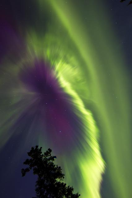 NASA image: CME Causes Colorful Aurora