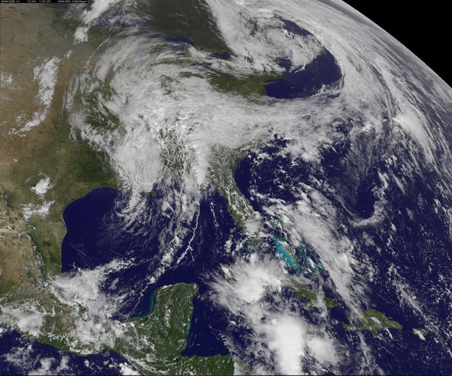 NASA image: Two Low Pressure Areas Fighting to Control the U.S. Mid-Atlantic Weather