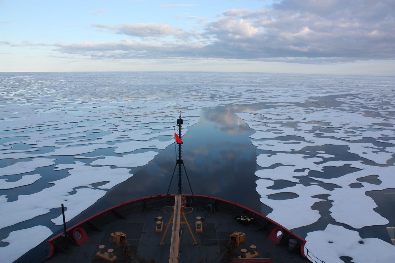 Scientists on board the U.S. Coast Guard Cutter Healy in the Beaufort Sea, northeast of Barrow, Alaska, finished collecting the mission¹s sea ice data and cruised south on July 20, 2011, through thin ice and ultimately into the open ocean.  The ICESCAPE mission, or &quot;Impacts of Climate on Ecosystems and Chemistry of the Arctic Pacific Environment,&quot; is a NASA shipborne investigation to study how changing conditions in the Arctic affect the ocean's chemistry and ecosystems. The bulk of the research took place in the Beaufort and Chukchi seas in summer 2010 and 2011. Credit: NASA/Kathryn Hansen Credit: NASA/Kathryn Hansen   <b><a href="http://www.nasa.gov/audience/formedia/features/MP_Photo_Guidelines.html" rel="nofollow">NASA image use policy.</a></b>  <b><a href="http://www.nasa.gov/centers/goddard/home/index.html" rel="nofollow">NASA Goddard Space Flight Center</a></b> enables NASA’s mission through four scientific endeavors: Earth Science, Heliophysics, Solar System Exploration, and Astrophysics. Goddard plays a leading role in NASA’s accomplishments by contributing compelling scientific knowledge to advance the Agency’s mission.  <b>Follow us on <a href="http://twitter.com/NASA_GoddardPix" rel="nofollow">Twitter</a></b>  <b>Like us on <a href="http://www.facebook.com/pages/Greenbelt-MD/NASA-Goddard/395013845897?ref=tsd" rel="nofollow">Facebook</a></b>  <b>Find us on <a href="http://instagrid.me/nasagoddard/?vm=grid" rel="nofollow">Instagram</a></b>