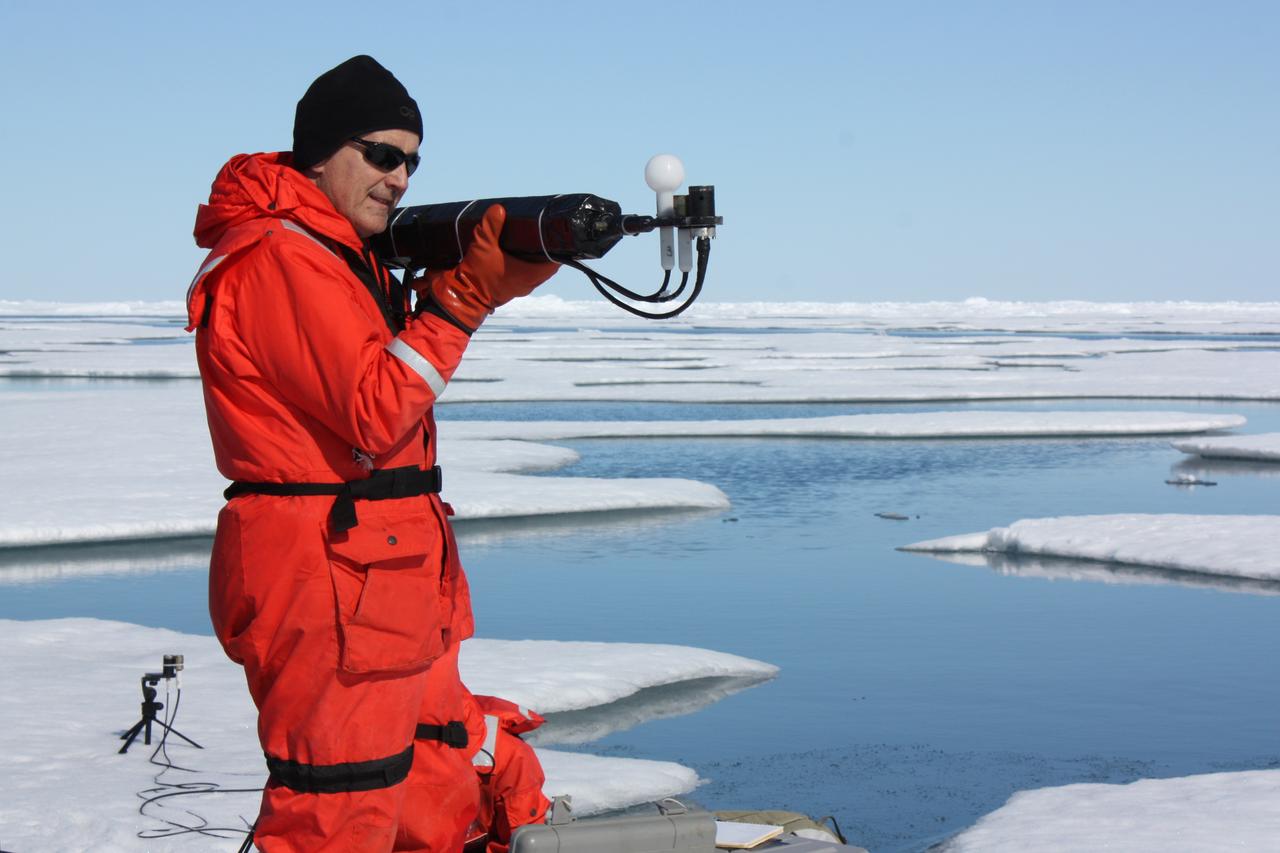 On July 13, 2011, Don Perovich, of Cold Regions Research and Engineering Laboratory, measured the light that drives photosynthesis at the sixth sea ice station of the 2011 ICESCAPE mission.  The ICESCAPE mission, or &quot;Impacts of Climate on Ecosystems and Chemistry of the Arctic Pacific Environment,&quot; is a NASA shipborne investigation to study how changing conditions in the Arctic affect the ocean's chemistry and ecosystems. The bulk of the research took place in the Beaufort and Chukchi seas in summer 2010 and 2011. Credit: NASA/Kathryn Hansen  <b><a href="http://www.nasa.gov/audience/formedia/features/MP_Photo_Guidelines.html" rel="nofollow">NASA image use policy.</a></b>  <b><a href="http://www.nasa.gov/centers/goddard/home/index.html" rel="nofollow">NASA Goddard Space Flight Center</a></b> enables NASA’s mission through four scientific endeavors: Earth Science, Heliophysics, Solar System Exploration, and Astrophysics. Goddard plays a leading role in NASA’s accomplishments by contributing compelling scientific knowledge to advance the Agency’s mission.  <b>Follow us on <a href="http://twitter.com/NASA_GoddardPix" rel="nofollow">Twitter</a></b>  <b>Like us on <a href="http://www.facebook.com/pages/Greenbelt-MD/NASA-Goddard/395013845897?ref=tsd" rel="nofollow">Facebook</a></b>  <b>Find us on <a href="http://instagrid.me/nasagoddard/?vm=grid" rel="nofollow">Instagram</a></b>