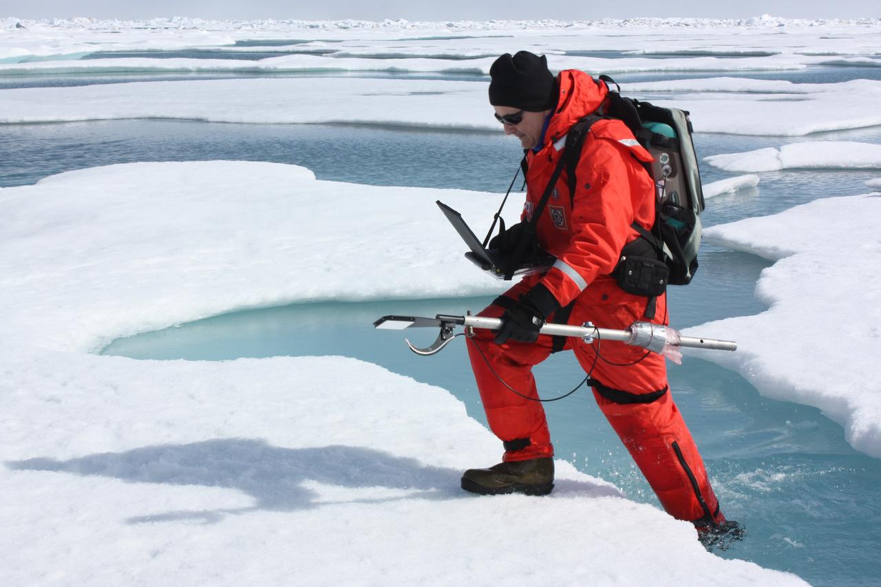 On July 10, 2011, Don Perovich, of Cold Regions Research and Engineering Laboratory, maneuvered through melt ponds collecting optical data along the way to get a sense of the amount of sunlight reflected from sea ice and melt ponds in the Chukchi Sea.  The ICESCAPE mission, or &quot;Impacts of Climate on Ecosystems and Chemistry of the Arctic Pacific Environment,&quot; is a NASA shipborne investigation to study how changing conditions in the Arctic affect the ocean's chemistry and ecosystems. The bulk of the research took place in the Beaufort and Chukchi seas in summer 2010 and 2011. Credit: NASA/Kathryn Hansen  <b><a href="http://www.nasa.gov/audience/formedia/features/MP_Photo_Guidelines.html" rel="nofollow">NASA image use policy.</a></b>  <b><a href="http://www.nasa.gov/centers/goddard/home/index.html" rel="nofollow">NASA Goddard Space Flight Center</a></b> enables NASA’s mission through four scientific endeavors: Earth Science, Heliophysics, Solar System Exploration, and Astrophysics. Goddard plays a leading role in NASA’s accomplishments by contributing compelling scientific knowledge to advance the Agency’s mission.  <b>Follow us on <a href="http://twitter.com/NASA_GoddardPix" rel="nofollow">Twitter</a></b>  <b>Like us on <a href="http://www.facebook.com/pages/Greenbelt-MD/NASA-Goddard/395013845897?ref=tsd" rel="nofollow">Facebook</a></b>  <b>Find us on <a href="http://instagrid.me/nasagoddard/?vm=grid" rel="nofollow">Instagram</a></b>