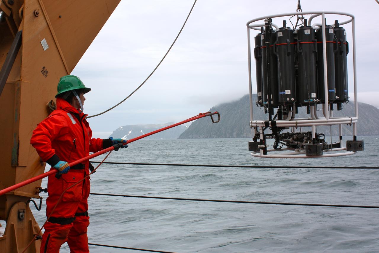 On June 28, 2011, Holley Kelly, a teacher from Farragut High School, helped retrieve the CTD/Rosette ensemble from the Bering Strait, east of the Diomede Islands.  The ICESCAPE mission, or &quot;Impacts of Climate on Ecosystems and Chemistry of the Arctic Pacific Environment,&quot; is a NASA shipborne investigation to study how changing conditions in the Arctic affect the ocean's chemistry and ecosystems. The bulk of the research took place in the Beaufort and Chukchi seas in summer 2010 and 2011. Credit: NASA/Kathryn Hansen  <b><a href="http://www.nasa.gov/audience/formedia/features/MP_Photo_Guidelines.html" rel="nofollow">NASA image use policy.</a></b>  <b><a href="http://www.nasa.gov/centers/goddard/home/index.html" rel="nofollow">NASA Goddard Space Flight Center</a></b> enables NASA’s mission through four scientific endeavors: Earth Science, Heliophysics, Solar System Exploration, and Astrophysics. Goddard plays a leading role in NASA’s accomplishments by contributing compelling scientific knowledge to advance the Agency’s mission.  <b>Follow us on <a href="http://twitter.com/NASA_GoddardPix" rel="nofollow">Twitter</a></b>  <b>Like us on <a href="http://www.facebook.com/pages/Greenbelt-MD/NASA-Goddard/395013845897?ref=tsd" rel="nofollow">Facebook</a></b>  <b>Find us on <a href="http://instagrid.me/nasagoddard/?vm=grid" rel="nofollow">Instagram</a></b>