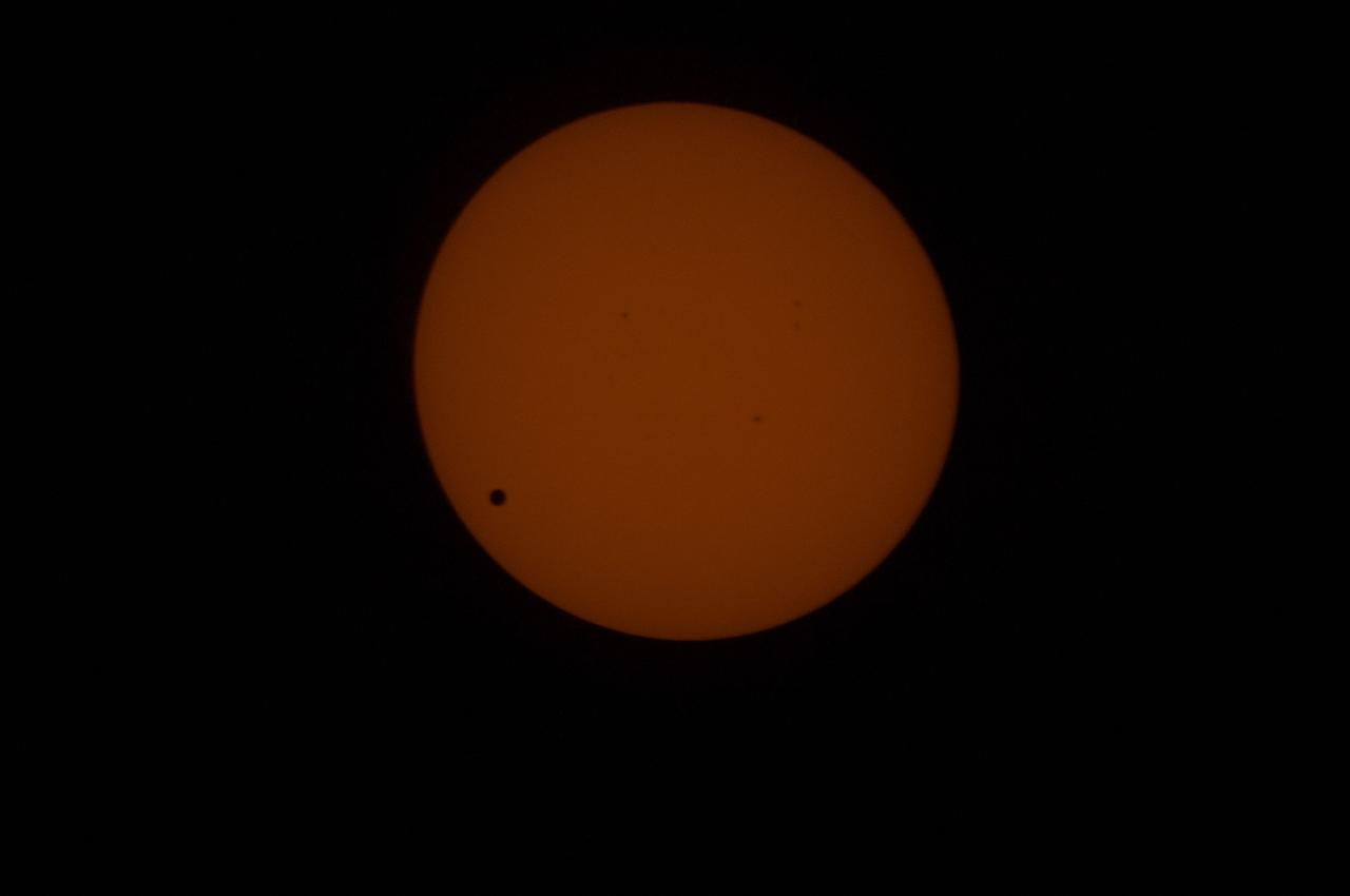 Transit of Venus as seen at 762nm in the CO Module.  This image is from NASA Astronaut Don Petttit shot from onboard the International Space Station on June 5, 2012.  Petttit, who had the foresight to bring a solar filter for his camera, will be capturing the June 5 Venus Transit from the International Space Station with the images downloading in almost real-time. He will photograph through the European Space Agency-built &quot;cupola&quot;, removing the scratch panes to get crisp, clear images.  Credit: NASA  <b>To read more about the 2012 Venus Transit go to: <a href="http://sunearthday.nasa.gov/transitofvenus" rel="nofollow">sunearthday.nasa.gov/transitofvenus</a> </b>  <b>Add your photos of the Transit of Venus to our Flickr Group here:  <a href="http://www.flickr.com/groups/venustransit/">www.flickr.com/groups/venustransit/</a> </b>  <b><a href="http://www.nasa.gov/audience/formedia/features/MP_Photo_Guidelines.html" rel="nofollow">NASA image use policy.</a></b>  <b><a href="http://www.nasa.gov/centers/goddard/home/index.html" rel="nofollow">NASA Goddard Space Flight Center</a></b> enables NASA’s mission through four scientific endeavors: Earth Science, Heliophysics, Solar System Exploration, and Astrophysics. Goddard plays a leading role in NASA’s accomplishments by contributing compelling scientific knowledge to advance the Agency’s mission.  <b>Follow us on <a href="http://twitter.com/NASA_GoddardPix" rel="nofollow">Twitter</a></b>  <b>Like us on <a href="http://www.facebook.com/pages/Greenbelt-MD/NASA-Goddard/395013845897?ref=tsd" rel="nofollow">Facebook</a></b>  <b>Find us on <a href="http://instagrid.me/nasagoddard/?vm=grid" rel="nofollow">Instagram</a></b>