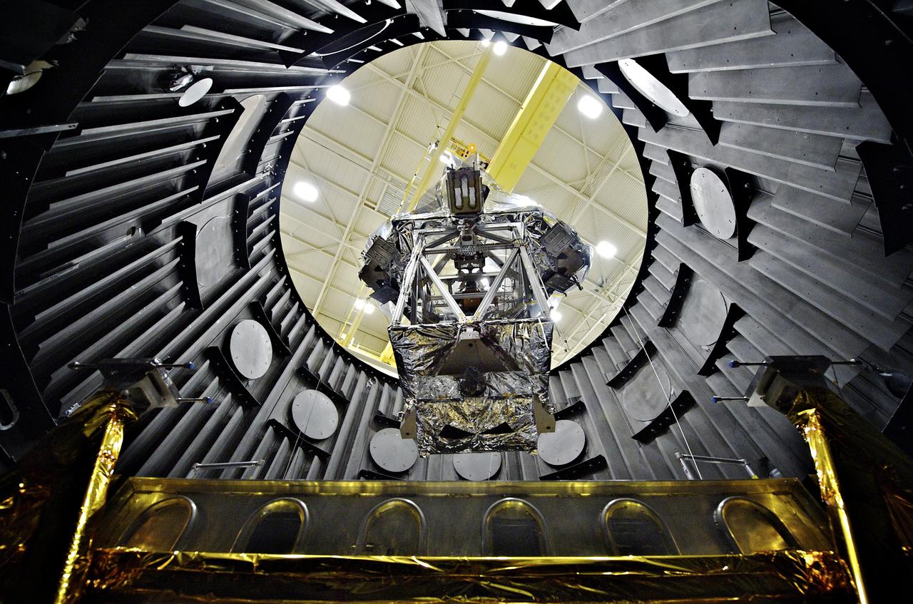 The OTE (Optical Telescope Element) Simulator or OSIM wrapped in a silver blanket on a platform, being lowered down into a vacuum chamber (called the Space Environment Simulator, or SES) by a crane to be tested to withstand the cold temperatures of space.  More information: <a href="http://www.nasa.gov/topics/technology/features/webb-osim.html" rel="nofollow">www.nasa.gov/topics/technology/features/webb-osim.html</a>  Credit: NASA Goddard/Chris Gunn  <b><a href="http://www.nasa.gov/audience/formedia/features/MP_Photo_Guidelines.html" rel="nofollow">NASA image use policy.</a></b>  <b><a href="http://www.nasa.gov/centers/goddard/home/index.html" rel="nofollow">NASA Goddard Space Flight Center</a></b> enables NASA’s mission through four scientific endeavors: Earth Science, Heliophysics, Solar System Exploration, and Astrophysics. Goddard plays a leading role in NASA’s accomplishments by contributing compelling scientific knowledge to advance the Agency’s mission.  <b>Follow us on <a href="http://twitter.com/NASA_GoddardPix" rel="nofollow">Twitter</a></b>  <b>Like us on <a href="http://www.facebook.com/pages/Greenbelt-MD/NASA-Goddard/395013845897?ref=tsd" rel="nofollow">Facebook</a></b>  <b>Find us on <a href="http://instagrid.me/nasagoddard/?vm=grid" rel="nofollow">Instagram</a></b>