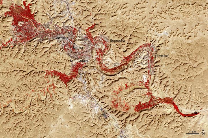 NASA image acquired Feb. 9, 2011  Less than 5 percent of Algeria’s land surface is suitable for growing crops, and most precipitation falls on the Atlas Mountains along the coast. Inland, dust-laden winds blow over rocky plains and sand seas. However, in north central Algeria—off the tip of Grand Erg Occidental and about 450 kilometers (280 miles) south of Algiers—lies a serpentine stretch of vegetation. It is the M’zab Valley, filled with palm groves and dotted with centuries-old settlements.  The Advanced Spaceborne Thermal Emission and Reflection Radiometer (ASTER) on NASA’s Terra satellite captured this image of M’zab Valley on February 9, 2011. ASTER combines infrared, red, and green wavelengths of light. Bare rock ranges in color from beige to peach. Buildings and paved surfaces appear gray. Vegetation is red, and brighter shades of red indicate more robust vegetation.  This oasis results from water that is otherwise in short supply in the Sahara Desert, thanks to the valley’s approximately 3,000 wells. Chemical analysis of Algerian aquifers, as well studies of topography in Algeria and Tunisia, suggest this region experienced a cooler climate in the late Pleistocene, and potentially heavy monsoon rains earlier in the Holocene. The M’zab region shows evidence of meandering rivers and pinnate drainage patterns. The vegetation lining M’zab Valley highlights this old river valley’s contours.  Cool summer temperatures and monsoon rains had long since retreated from the region by eleventh century, but this valley nevertheless supported the establishment of multiple fortified settlements, or ksours. Between 1012 A.D. and 1350 A.D., locals established the ksours of El-Atteuf, Bounoura, Melika, Ghardaïa, and Beni-Isguen. Collectively these cities are now a United Nations Educational, Scientific, and Cultural Organization (UNESCO) World Heritage site.  NASA Earth Observatory image by Robert Simmon and Jesse Allen, using data from the GSFC/METI/ERSDAC/JAROS, and U.S./Japan ASTER Science Team. Caption by Michon Scott.  Instrument: Terra - ASTER  <b>To download the full high res file go <a href="http://earthobservatory.nasa.gov/IOTD/view.php?id=51296" rel="nofollow"> here</a></b>