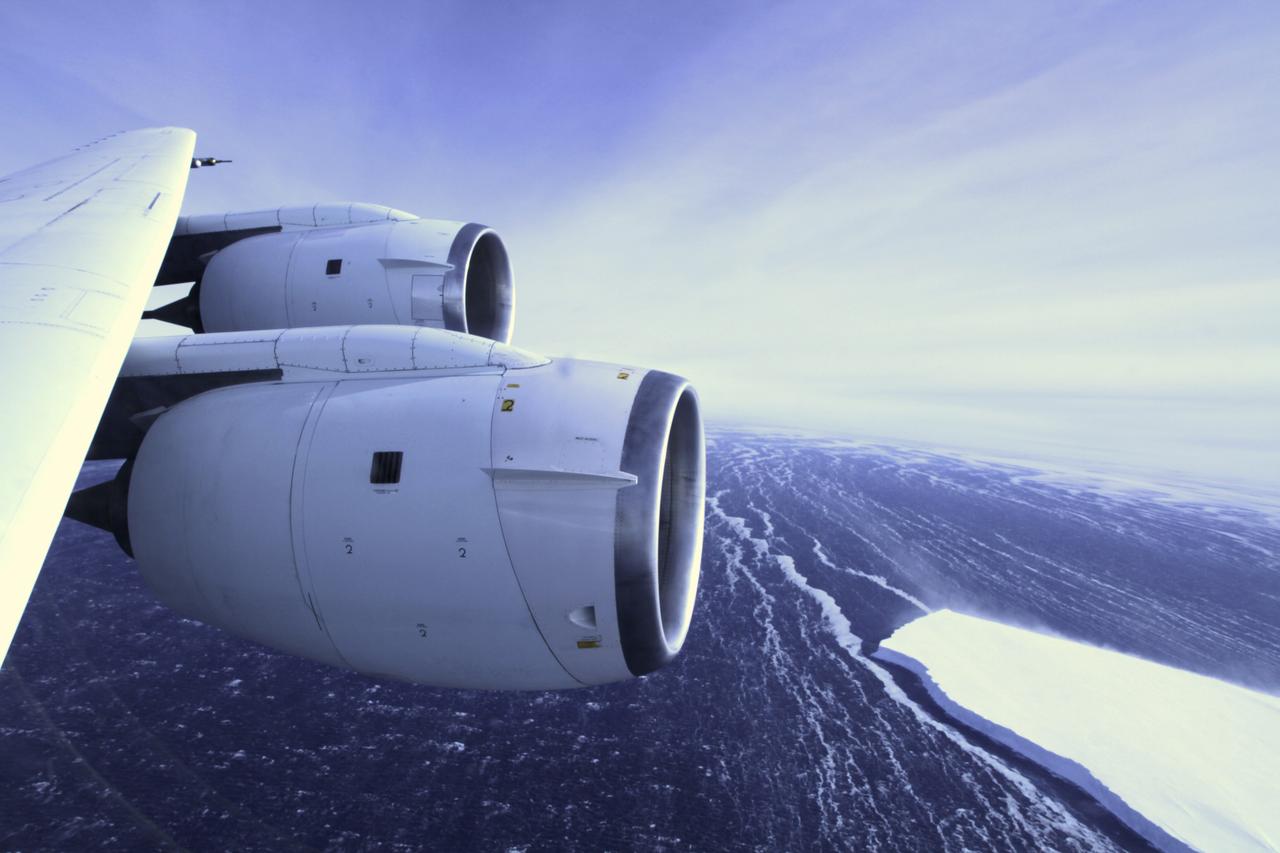 During a flight over the Pine Island Glacier ice shelf, the DC-8 banks over the Amundsen Sea and the clean edge of the ice shelf front. The shelf drops about 200 feet from its surface to sea level. This image was taken on Oct. 26, 2011. Credit: NASA/GSFC/Jefferson Beck NASA's Operation IceBridge returns to a base camp of Punta Arenas, Chile for the third year of flights over Antarctica's changing sea ice, glaciers and ice sheets. NASA's DC-8, outfitted with seven remote-sensing instruments, and a Gulfstream 5 operated by the National Science Foundation and National Center for Atmospheric Research and outfitted with a high-altitude laser-ranging mapper, will fly from Chile over Antarctica in October and November. The mission is designed to record changes to Antarctica's ice sheets and give scientists insight into what is driving those changes. Follow the progress of the mission: Campaign News site: <a href="http://www.nasa.gov/mission_pages/icebridge/index.html" rel="nofollow">www.nasa.gov/mission_pages/icebridge/index.html</a> IceBridge blog: <a href="http://blogs.nasa.gov/cm/newui/blog/viewpostlist.jsp?blogname=icebridge" rel="nofollow">blogs.nasa.gov/cm/newui/blog/viewpostlist.jsp?blogname=ic...</a> Twitter: @nasa_ice <b><a href="http://www.nasa.gov/audience/formedia/features/MP_Photo_Guidelines.html" rel="nofollow">NASA image use policy.</a></b> <b><a href="http://www.nasa.gov/centers/goddard/home/index.html" rel="nofollow">NASA Goddard Space Flight Center</a></b> enables NASA’s mission through four scientific endeavors: Earth Science, Heliophysics, Solar System Exploration, and Astrophysics. Goddard plays a leading role in NASA’s accomplishments by contributing compelling scientific knowledge to advance the Agency’s mission. <b>Follow us on <a href="http://twitter.com/NASA_GoddardPix" rel="nofollow">Twitter</a></b> <b>Like us on <a href="http://www.facebook.com/pages/Greenbelt-MD/NASA-Goddard/395013845897?ref=tsd" rel="nofollow">Facebook</a></b> <b>Find us on <a href="http://instagrid.me/nasagoddard/?vm=grid" rel="nofollow">Instagram</a></b>
