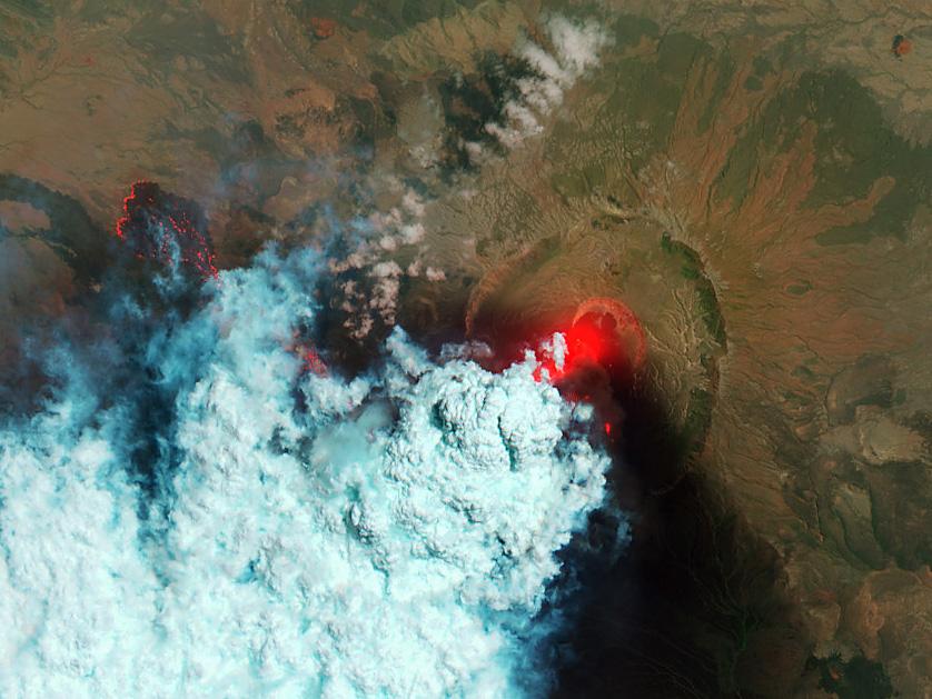 NASA image acquired June 24, 2011  Since it began erupting on June 12, 2011, emissions from Eritrea’s Nabro Volcano have drifted over much of East Africa and the Middle East. Ash has displaced residents living near the volcano and disrupted flights in the region. Despite the volcano’s widespread effects, little is known about the eruption. Nabro is located in an isolated region along the border between Eritrea and Ethiopia, and few English-language reports have been published. Satellite remote sensing is currently the only reliable way to monitor the ongoing eruption.  This satellite image is among the first detailed pictures of the erupting vent and lava flows. They were acquired by the Advanced Land Imager (ALI) aboard the Earth Observing-1 (EO-1) satellite on June 24, 2011.  The bright red portions of the false-color image (top) indicate hot surfaces. Hot volcanic ash glows above the vent, located in the center of Nabro’s caldera. To the west of the vent, portions of an active lava flow (particularly the front of the flow) are also hot. The speckled pattern on upstream portions of the flow are likely due to the cool, hardened crust splitting and exposing fluid lava as the flow advances. The bulbous blue-white cloud near the vent is likely composed largely of escaping water vapor that condensed as the plume rose and cooled. The whispy, cyan clouds above the lava flow are evidence of degassing from the lava.  NASA Earth Observatory image by Robert Simmon, using EO-1 ALI data. Caption by Robert Simmon.  Instrument: EO-1 - ALI  To download the high res go here: <a href="http://earthobservatory.nasa.gov/IOTD/view.php?id=51216" rel="nofollow">earthobservatory.nasa.gov/IOTD/view.php?id=51216</a>  <b><a href="http://www.nasa.gov/centers/goddard/home/index.html" rel="nofollow">NASA Goddard Space Flight Center</a></b> enables NASA’s mission through four scientific endeavors: Earth Science, Heliophysics, Solar System Exploration, and Astrophysics. Goddard plays a leading role in NASA’s accomplishments by contributing compelling scientific knowledge to advance the Agency’s mission.  <b>Follow us on <a href="http://twitter.com/NASA_GoddardPix" rel="nofollow">Twitter</a></b>  <b>Like us on <a href="http://www.facebook.com/pages/Greenbelt-MD/NASA-Goddard/395013845897?ref=tsd" rel="nofollow">Facebook</a></b>  <b>Find us on <a href="http://web.stagram.com/n/nasagoddard/?vm=grid" rel="nofollow">Instagram</a></b>