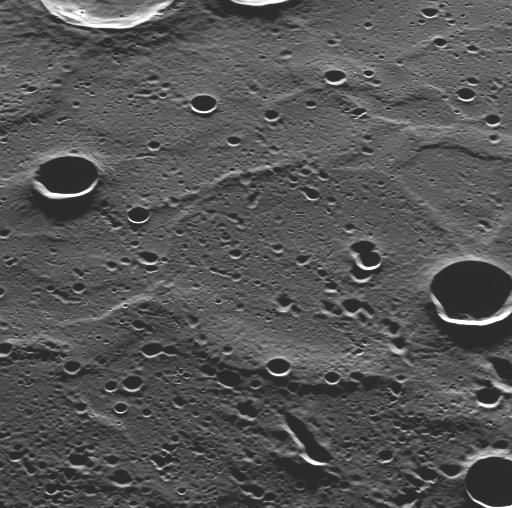 NASA acquired: March 29, 2011  As the MESSENGER spacecraft passed low over Mercury's north polar region, MDIS used its pivot to capture this image, showing terrain that had not been previously seen by spacecraft. The newly imaged surface is located in Mercury's north polar region, to the north of the bright, rayed crater Hokusai. Looking from the bottom of the image toward the top is looking southward, just as MDIS was doing when this image was acquired.   This newly seen terrain shows craters with long shadows, as expected at this high northern latitude. Understanding the interiors of the craters in Mercury's polar regions and any ices they may contain is one of the main science goals of the MESSENGER mission. The long shadows also accentuate the topography of the surface, which includes a number of ridges that resemble those seen on the expansive smooth plains imaged during Mercury flyby 3.  On March 17, 2011 (March 18, 2011, UTC), MESSENGER became the first spacecraft ever to orbit the planet Mercury. The mission is currently in its commissioning phase, during which spacecraft and instrument performance are verified through a series of specially designed checkout activities. In the course of the one-year primary mission, the spacecraft's seven scientific instruments and radio science investigation will unravel the history and evolution of the Solar System's innermost planet. Visit the Why Mercury? section of this website to learn more about the science questions that the MESSENGER mission has set out to answer.  Credit: NASA/Johns Hopkins University Applied Physics Laboratory/Carnegie Institution of Washington  <b><a href="http://www.nasa.gov/centers/goddard/home/index.html" rel="nofollow">NASA Goddard Space Flight Center</a></b> enables NASA’s mission through four scientific endeavors: Earth Science, Heliophysics, Solar System Exploration, and Astrophysics. Goddard plays a leading role in NASA’s accomplishments by contributing compelling scientific knowledge to advance the Agency’s mission.  <b>Follow us on <a href="http://twitter.com/NASA_GoddardPix" rel="nofollow">Twitter</a></b>  <b>Join us on <a href="http://www.facebook.com/pages/Greenbelt-MD/NASA-Goddard/395013845897?ref=tsd" rel="nofollow">Facebook</a></b>