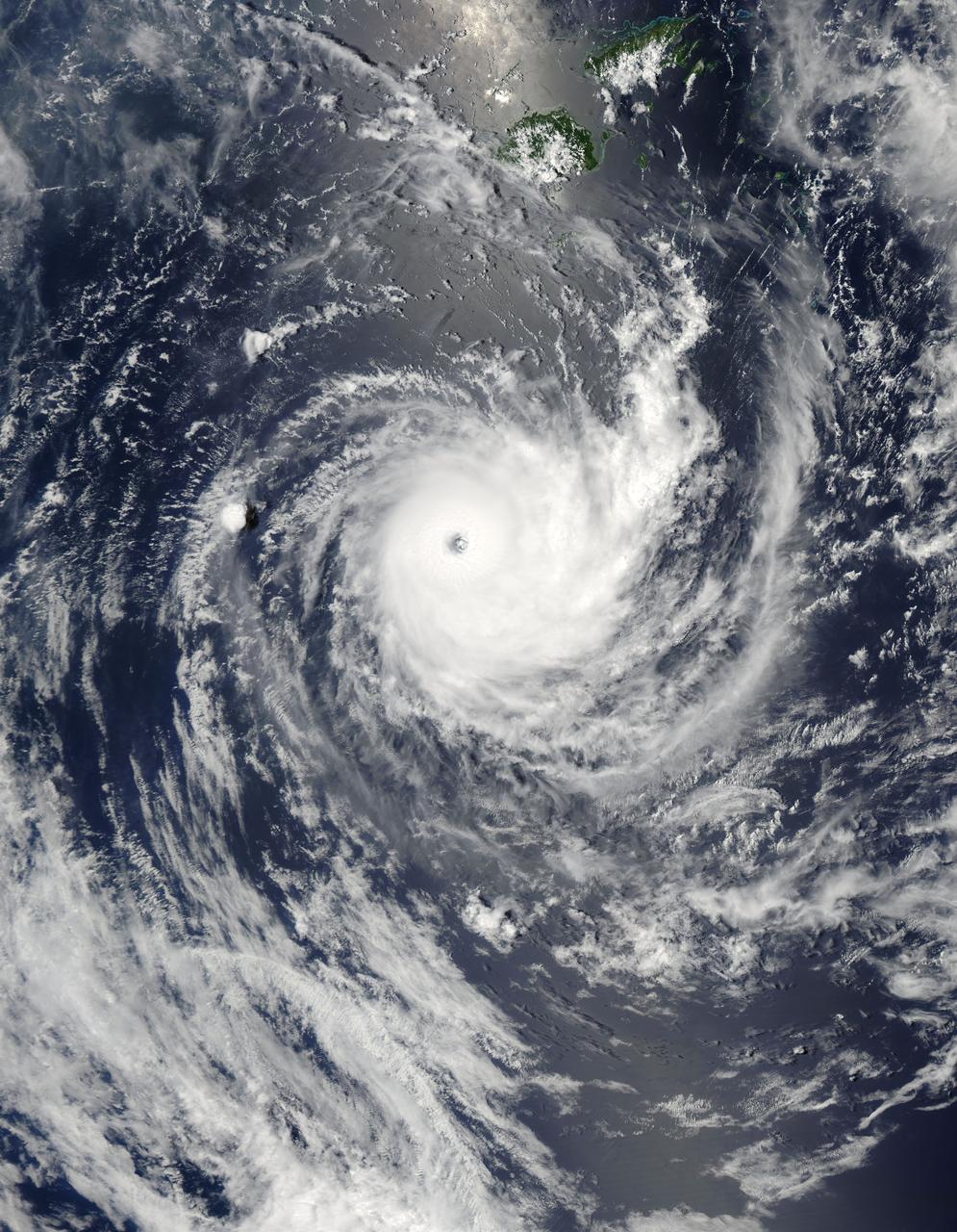 NASA image acquired January 26,02011 Tropical Cyclone Wilma raged over the Pacific Ocean in late January 2011. At 8:00 p.m. New Caledonia time (9:00 UTC) on January 26, the U.S. Navy’s Joint Typhoon Warning Center (JTWC) reported that Wilma was located some 555 nautical miles (1,030 kilometers) east of Noumea, New Caledonia. Wilma packed maximum sustained winds of 115 knots (215 kilometers per hour) with gusts up to 140 knots (260 kilometers per hour). The Moderate Resolution Imaging Spectroradiometer (MODIS) on NASA’s Aqua satellite captured this natural-color image at 12:45 p.m. New Caledonia time (1:45 UTC) on January 26, 2011. Wilma has a tightly coiled configuration and a well-defined eye. The storm hovers over the Pacific Ocean just south of Fiji. According to the JTWC, Wilma would remain strong for a day or so, then would being to gradually weaken, thanks to greater vertical wind shear and lower sea surface temperatures. NASA/GSFC/Jeff Schmaltz/MODIS Land Rapid Response Team <b><a href="http://www.nasa.gov/centers/goddard/home/index.html" rel="nofollow">NASA Goddard Space Flight Center</a></b> enables NASA’s mission through four scientific endeavors: Earth Science, Heliophysics, Solar System Exploration, and Astrophysics. Goddard plays a leading role in NASA’s accomplishments by contributing compelling scientific knowledge to advance the Agency’s mission. <b>Follow us on <a href="http://twitter.com/NASA_GoddardPix" rel="nofollow">Twitter</a></b> <b>Join us on <a href="http://www.facebook.com/pages/Greenbelt-MD/NASA-Goddard/395013845897?ref=tsd" rel="nofollow">Facebook</a></b>