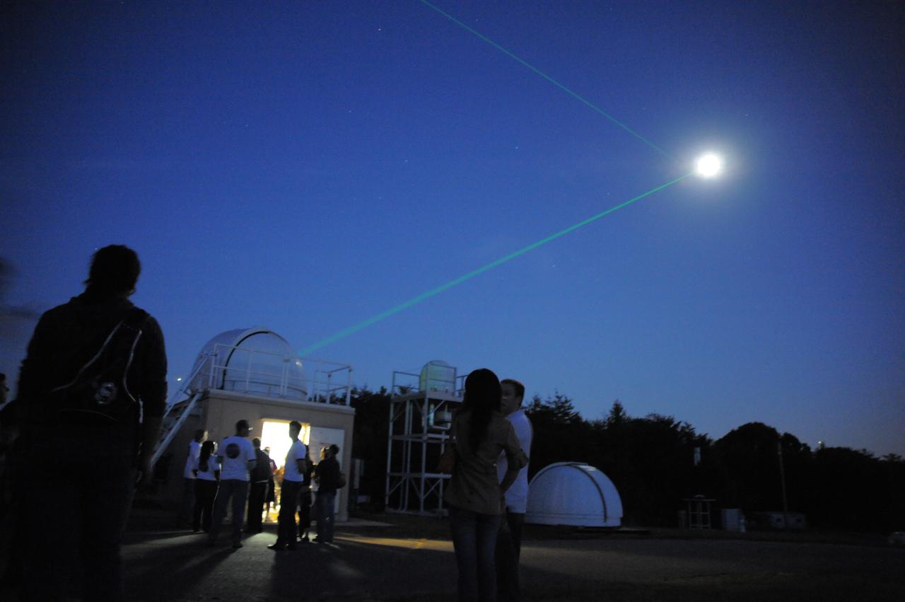 Visitors get a rare opportunity to view laser beams pointed at the moon at Optical Site.  Goddard's Laser Ranging Facility directs a laser toward the Lunar Reconassaince Orbiter on International Observe the Moon Night. (Sept 18, 2010)  Background on laser ranging: <a href="http://www.nasa.gov/mission_pages/LRO/news/LRO_lr.html" rel="nofollow">www.nasa.gov/mission_pages/LRO/news/LRO_lr.html</a>  Credit: NASA/GSFC/Debbie Mccallum  On September 18, 2010 the world joined the NASA Goddard Space Flight Center's Visitor Center in Greenbelt, Md., as well as other NASA Centers to celebrate the first annual International Observe the Moon Night (InOMN).  To read more go to: <a href="http://www.nasa.gov/centers/goddard/news/features/2010/moon-night.html" rel="nofollow">www.nasa.gov/centers/goddard/news/features/2010/moon-nigh...</a>  <b><a href="http://www.nasa.gov/centers/goddard/home/index.html" rel="nofollow">NASA Goddard Space Flight Center</a></b>  contributes to NASA’s mission through four scientific endeavors: Earth Science, Heliophysics, Solar System Exploration, and Astrophysics. Goddard plays a leading role in NASA’s endeavors by providing compelling scientific knowledge to advance the Agency’s mission.  <b>Follow us on <a href="http://twitter.com/NASA_GoddardPix" rel="nofollow">Twitter</a></b>  <b>Join us on <a href="http://www.facebook.com/pages/Greenbelt-MD/NASA-Goddard/395013845897?ref=tsd" rel="nofollow">Facebook</a></b>