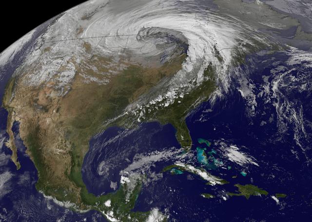 NASA image acquired October 26, 2010  The storm that swept across the center of the United States on October 26 and October 27, 2010, was memorable to those who experienced it because of its strong winds, rain, hail, and widespread tornadoes. Meteorologists get excited about the storm because it set a record for the lowest pressure (not associated with a hurricane) measured over land in the continental United States. At 5:13 p.m. CDT, the weather station in Bigfork, Minnesota recorded 955.2 millibars (28.21 inches of pressure). Pressure is one indicator of a storm’s strength, and this measurement corresponds to the pressure seen in a Category 3 hurricane.  This image, taken by the GOES satellite on October 26, shows the storm system circling around the area of extreme low pressure. Such extratropical cyclones form over the United States in the spring and fall, when the temperature difference from north to south is large. Warm, high-pressure air rushes toward the cooler, low-pressure air in the north. Because the Earth is rotating, the air moving in ends up circling the area of low pressure, creating the cyclone shown in the image. The intensity of the storm is determined by the pressure difference between the center and the outer edges. Extreme low pressure in the center of the storm, therefore, is an indicator that the storm was very intense.  The animation shows the storm developing starting late on October 25 and running through October 27. The cyclone formed very quickly on October 26, taking a distinctive comma shape as the day went on. The storm developed so quickly, in fact, that it is classified as a bomb, an extremely fast developing storm (dropping at least one millibar of pressure per hour for 24 hours), more common over water than land.  The storm was also huge. Though the area of low pressure is centered over the Upper Midwest, the storm reached from the Gulf of Mexico into Canada, and from the Rocky Mountains to the Atlantic Ocean.  Extratropical cyclones bring an array of unsettled weather, including strong wind, rain, hail, and tornadoes, and this cyclone brought all of that. On October 26–27, winds gusted up to 78 miles per hour in Michigan, with high winds throughout the Midwest. The National Weather Service reported 61 tornadoes over the two days. Heavy snow also fell in the north.  NASA Earth Observatory imagery created by Jesse Allen, using imagery provided courtesy of the NASA GOES Project Science Office. Caption by Holli RIebeek.  Instrument: GOES  Credit: <b><a href="http://www.earthobservatory.nasa.gov/" rel="nofollow"> NASA Earth Observatory</a></b>  <b><a href="http://www.nasa.gov/centers/goddard/home/index.html" rel="nofollow">NASA Goddard Space Flight Center</a></b> enables NASA’s mission through four scientific endeavors: Earth Science, Heliophysics, Solar System Exploration, and Astrophysics. Goddard plays a leading role in NASA’s accomplishments by contributing compelling scientific knowledge to advance the Agency’s mission.  <b>Follow us on <a href="http://twitter.com/NASA_GoddardPix" rel="nofollow">Twitter</a></b>  <b>Join us on <a href="http://www.facebook.com/pages/Greenbelt-MD/NASA-Goddard/395013845897?ref=tsd" rel="nofollow">Facebook</a></b>
