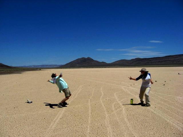 Sometimes, a gunfight breaks out, like this one between (left) Mindy Krzykowski and (right) Leva McIntire. This is the wild West, after all.  Photo credit: NASA/GSFC/Maggie McAdam  To read a feature story on the Racetrack Playa go to: <a href="http://www.nasa.gov/topics/earth/features/roving-rocks.html" rel="nofollow">www.nasa.gov/topics/earth/features/roving-rocks.html</a>  <b><a href="http://www.nasa.gov/centers/goddard/home/index.html" rel="nofollow">NASA Goddard Space Flight Center</a></b>  is home to the nation's largest organization of combined scientists, engineers and technologists that build spacecraft, instruments and new technology to study the Earth, the sun, our solar system, and the universe.  <b>Follow us on <a href="http://twitter.com/NASA_GoddardPix" rel="nofollow">Twitter</a></b>  <b>Join us on <a href="http://www.facebook.com/pages/Greenbelt-MD/NASA-Goddard/395013845897?ref=tsd" rel="nofollow">Facebook</a><b></b></b>
