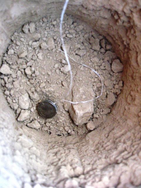 This is a Hygrochron sensor. Sensors were buried at different depths, to see how the temperature and moisture levels in the ground changed close to and farther from the surface. Special permission from the National Park Service is needed to dig at Racetrack Playa. Photo credit: NASA/GSFC/Maggie McAdam To read a feature story on the Racetrack Playa go to: <a href="http://www.nasa.gov/topics/earth/features/roving-rocks.html" rel="nofollow">www.nasa.gov/topics/earth/features/roving-rocks.html</a> <b><a href="http://www.nasa.gov/centers/goddard/home/index.html" rel="nofollow">NASA Goddard Space Flight Center</a></b> is home to the nation's largest organization of combined scientists, engineers and technologists that build spacecraft, instruments and new technology to study the Earth, the sun, our solar system, and the universe. <b>Follow us on <a href="http://twitter.com/NASA_GoddardPix" rel="nofollow">Twitter</a></b> <b>Join us on <a href="http://www.facebook.com/pages/Greenbelt-MD/NASA-Goddard/395013845897?ref=tsd" rel="nofollow">Facebook</a><b></b></b>