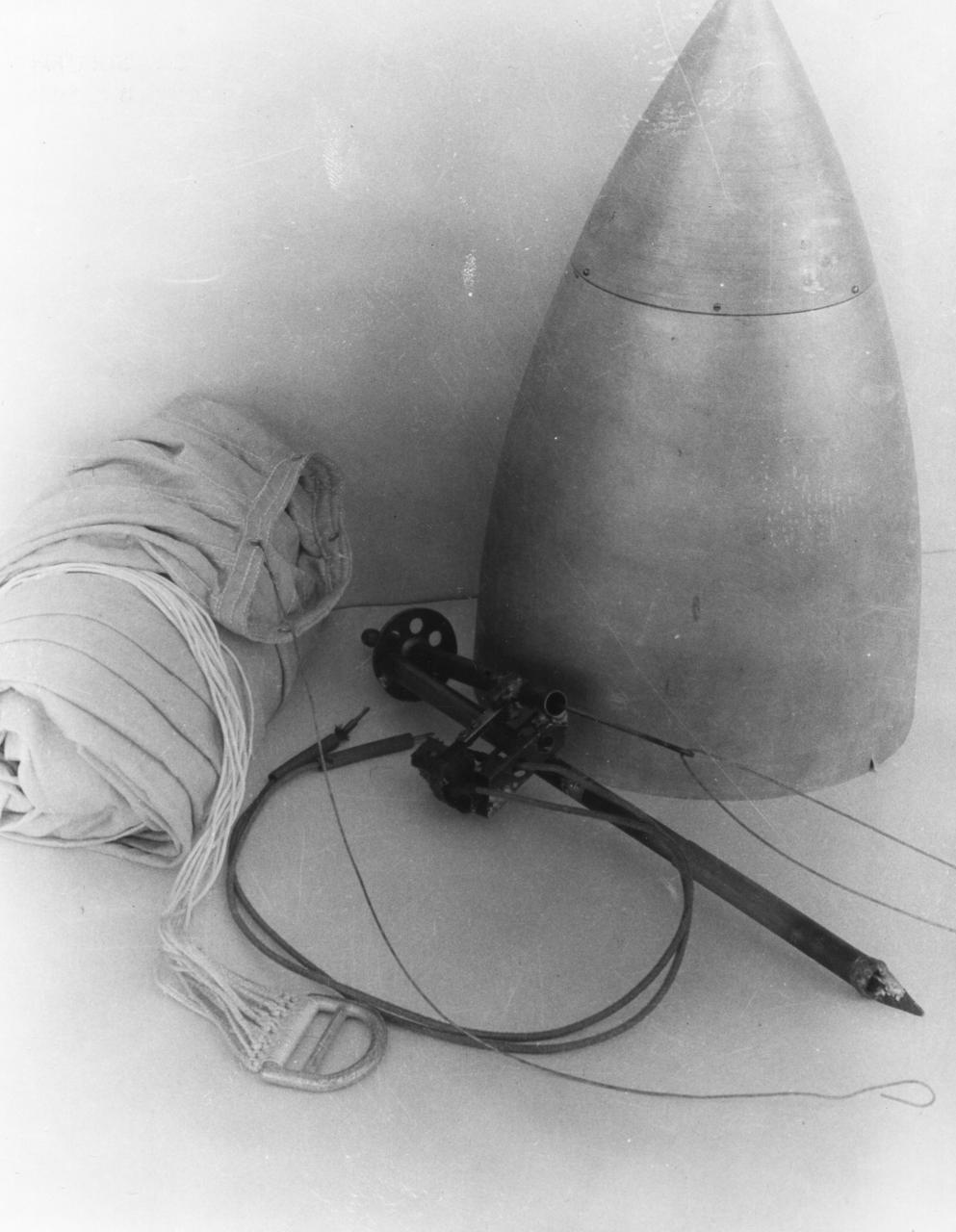 Dr. Robert Goddard's rocket nose cone, parachute, and relase device, April 19, 1935. <b><a href="http://www.nasa.gov/centers/goddard/home/index.html" rel="nofollow">NASA Goddard Space Flight Center</a></b> enables NASA’s mission through four scientific endeavors: Earth Science, Heliophysics, Solar System Exploration, and Astrophysics. Goddard plays a leading role in NASA’s accomplishments by contributing compelling scientific knowledge to advance the Agency’s mission. <b>Follow us on <a href="http://twitter.com/NASA_GoddardPix" rel="nofollow">Twitter</a></b> <b>Join us on <a href="http://www.facebook.com/pages/Greenbelt-MD/NASA-Goddard/395013845897?ref=tsd" rel="nofollow">Facebook</a></b>