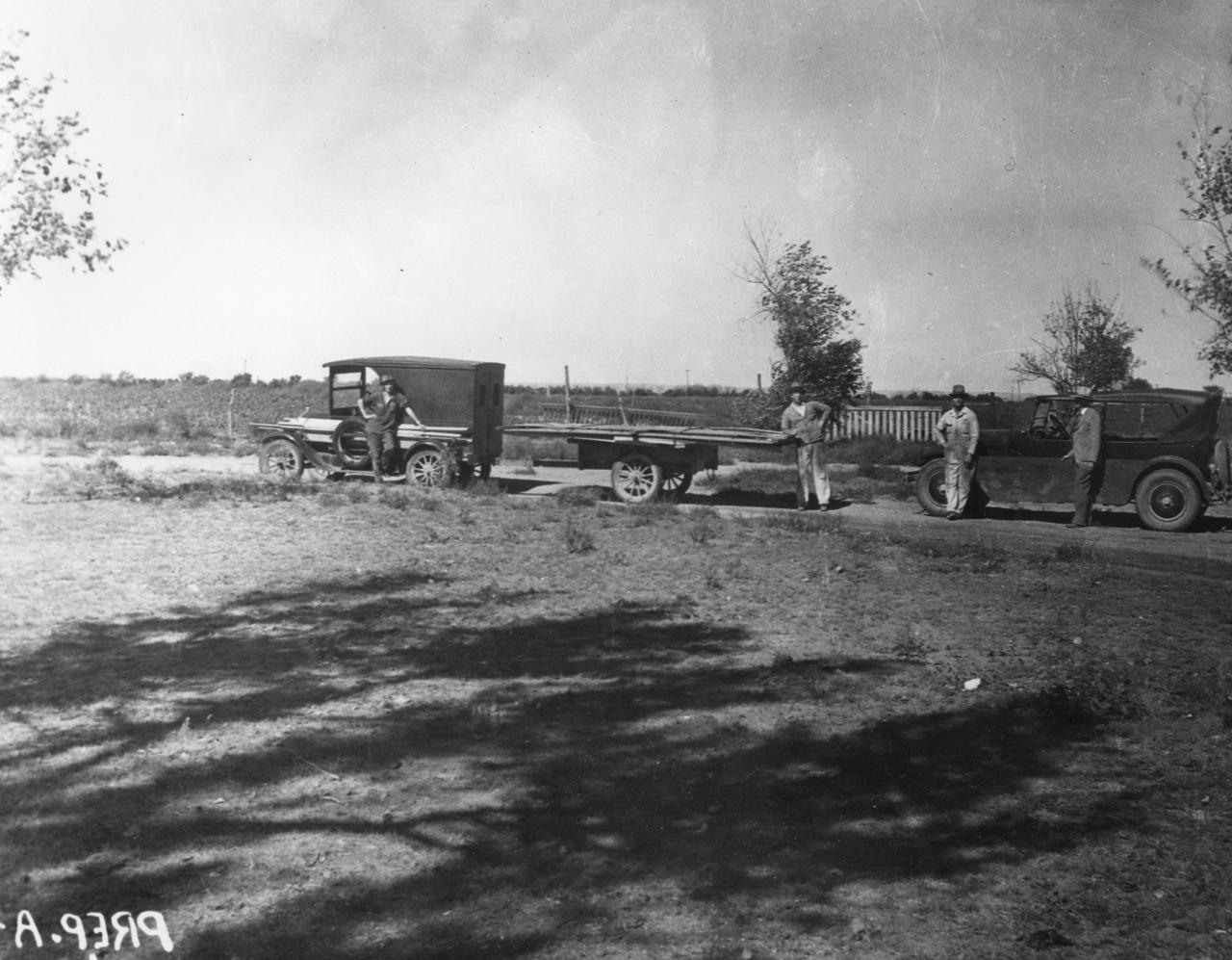 Dr. Robert Goddard's staff and vehicles (Ford truck, trailer, and Dodge touring car) ready to start on a day of repairing the launching tower, September 1934. <b><a href="http://www.nasa.gov/centers/goddard/home/index.html" rel="nofollow">NASA Goddard Space Flight Center</a></b> enables NASA’s mission through four scientific endeavors: Earth Science, Heliophysics, Solar System Exploration, and Astrophysics. Goddard plays a leading role in NASA’s accomplishments by contributing compelling scientific knowledge to advance the Agency’s mission. <b>Follow us on <a href="http://twitter.com/NASA_GoddardPix" rel="nofollow">Twitter</a></b> <b>Join us on <a href="http://www.facebook.com/pages/Greenbelt-MD/NASA-Goddard/395013845897?ref=tsd" rel="nofollow">Facebook</a></b>