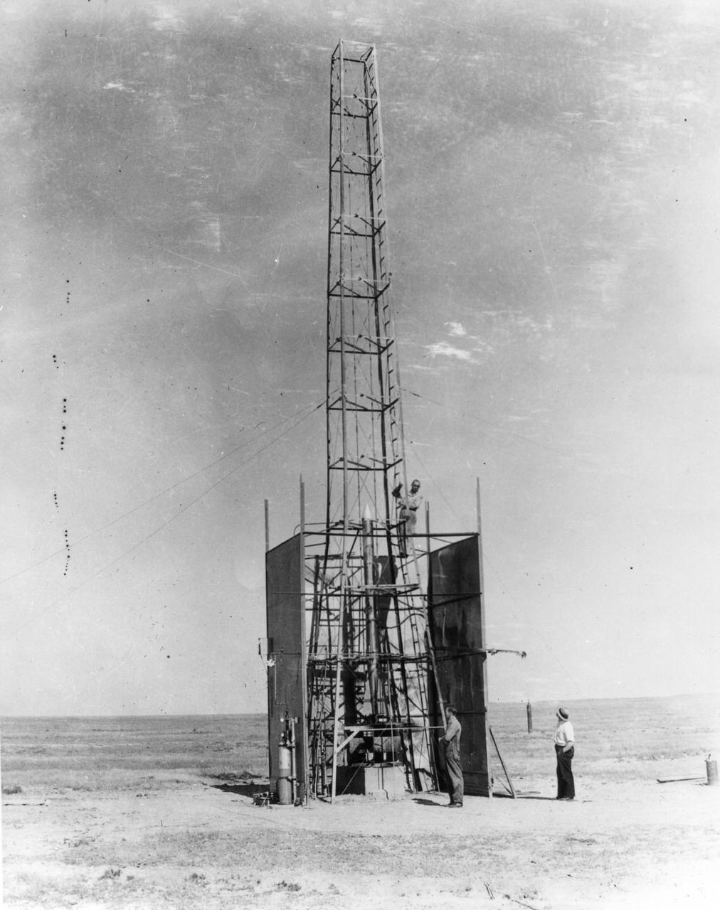 New Mexico -- Dr. Robert Goddard's rocket is being setup for the test that took place on October 29, 1935. It was a good flight. The rocket rose 4,000 feet--time in seconds. <b><a href="http://www.nasa.gov/centers/goddard/home/index.html" rel="nofollow">NASA Goddard Space Flight Center</a></b> enables NASA’s mission through four scientific endeavors: Earth Science, Heliophysics, Solar System Exploration, and Astrophysics. Goddard plays a leading role in NASA’s accomplishments by contributing compelling scientific knowledge to advance the Agency’s mission. <b>Follow us on <a href="http://twitter.com/NASA_GoddardPix" rel="nofollow">Twitter</a></b> <b>Join us on <a href="http://www.facebook.com/pages/Greenbelt-MD/NASA-Goddard/395013845897?ref=tsd" rel="nofollow">Facebook</a></b>