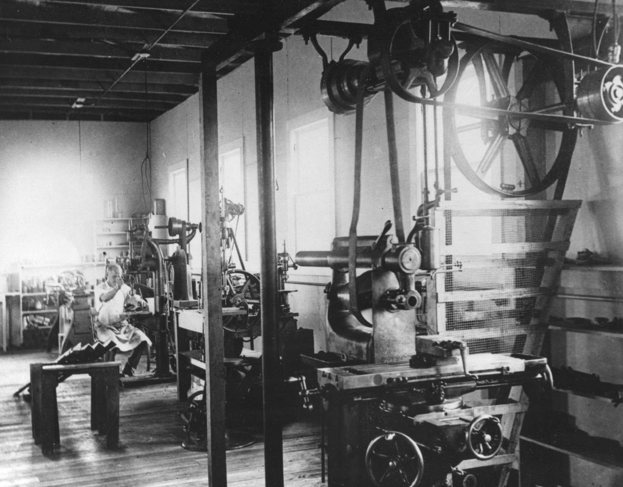 Interior view along the south side of Dr. Robert Goddard’s shop at the Mescalero Ranch in New Mexico. Mr. H. Sachs is shown seated in the rear of the shop. <b><a href="http://www.nasa.gov/centers/goddard/home/index.html" rel="nofollow">NASA Goddard Space Flight Center</a></b> enables NASA’s mission through four scientific endeavors: Earth Science, Heliophysics, Solar System Exploration, and Astrophysics. Goddard plays a leading role in NASA’s accomplishments by contributing compelling scientific knowledge to advance the Agency’s mission. <b>Follow us on <a href="http://twitter.com/NASA_GoddardPix" rel="nofollow">Twitter</a></b> <b>Join us on <a href="http://www.facebook.com/pages/Greenbelt-MD/NASA-Goddard/395013845897?ref=tsd" rel="nofollow">Facebook</a></b>