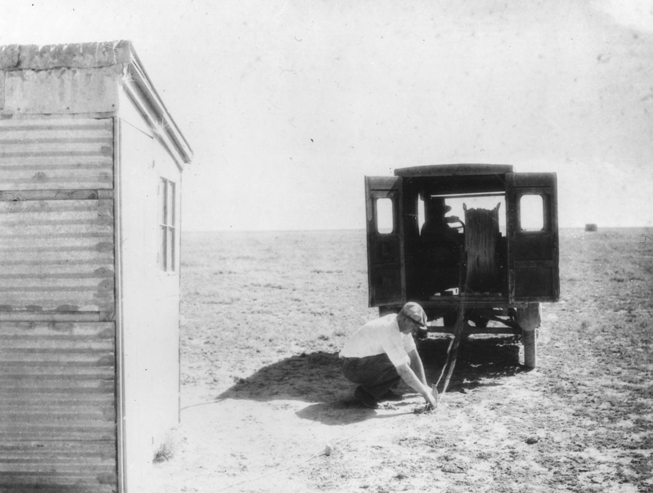 1930—Preparations are made to unreal remote control wires. The shelter in distance is 1,000 feet from Dr. Robert Goddard’s rocket launching tower, 10 miles northwest of Roswell, New Mexico. The shelter at left is 55 feet from the tower, and was used for static test only. It was later removed. <b><a href="http://www.nasa.gov/centers/goddard/home/index.html" rel="nofollow">NASA Goddard Space Flight Center</a></b> enables NASA’s mission through four scientific endeavors: Earth Science, Heliophysics, Solar System Exploration, and Astrophysics. Goddard plays a leading role in NASA’s accomplishments by contributing compelling scientific knowledge to advance the Agency’s mission. <b>Follow us on <a href="http://twitter.com/NASA_GoddardPix" rel="nofollow">Twitter</a></b> <b>Join us on <a href="http://www.facebook.com/pages/Greenbelt-MD/NASA-Goddard/395013845897?ref=tsd" rel="nofollow">Facebook</a></b>