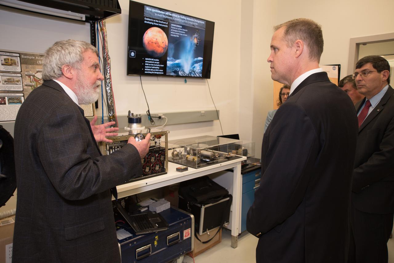NASA Administrator Jim Bridenstine listens to Dr. Antti Pulkkinen of Goddard Space Flight Center’s Heliophysics Science Division talk about various space agency programs designed to better understand the sun.