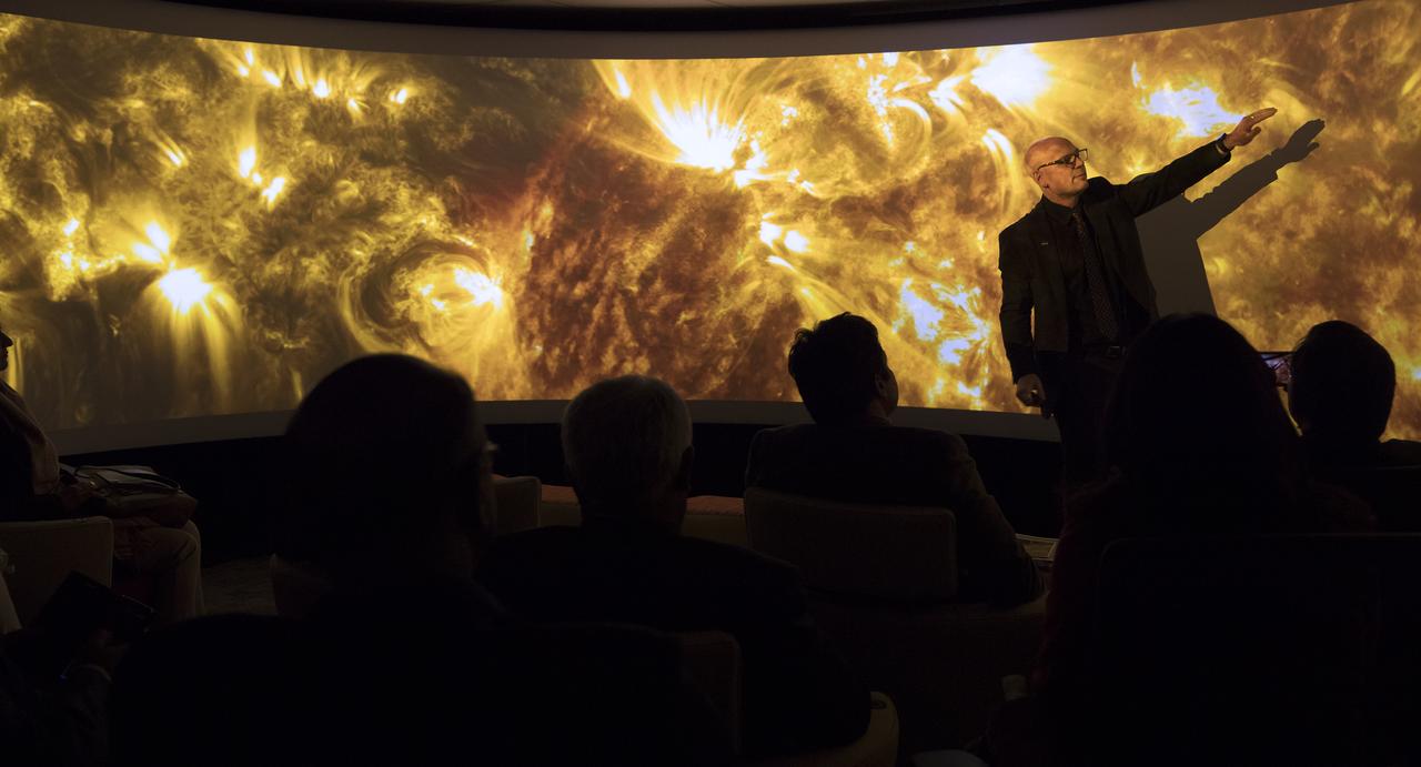 Defence Research & Development Organisation DRDO, Government of India Delegation visited Goddard October 25, 2018.  Group toured Goddard facilities such as Hyperwall, Earth Sciences and Heliophysics.  Alex Young briefs the group on solar image.