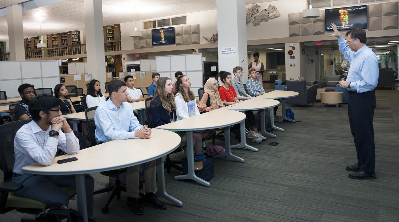 AIAA science fair winners visited Goddard July 23-26, 2019   Tupper Hyde speaks to group B21