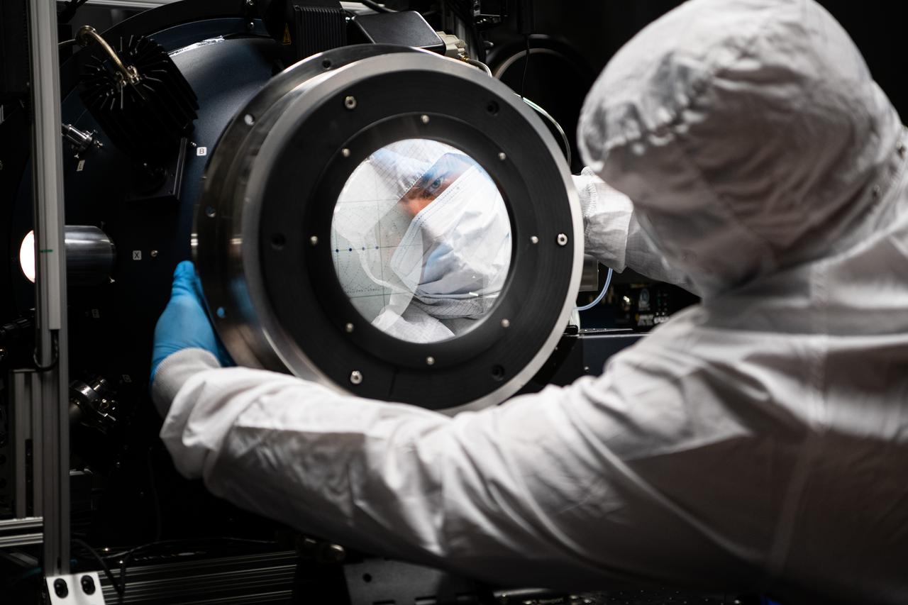 Senior Engineer George Hilton adjusts a polarizer during GSE testing of the Ocean Color Instrument Engineering Test Unit at NASA Goddard Space Flight Center on December 10th, 2020. Photo Credit: (NASA/Denny Henry)