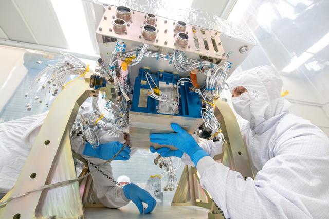 NASA image: OCI Main Control Electronics Box Installation