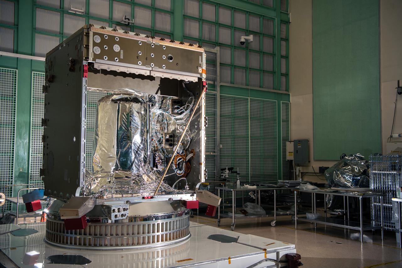 The flight propellant tank is visible inside the  partially assembled Plankton, Aerosol, Cloud, ocean Ecosystem (PACE) Spacecraft structure in the cleanroom at NASA Goddard Space Flight Center in Greenbelt, Maryland on February 24th, 2022. PACE's unprecedented spectral coverage will provide the first-ever global measurements designed to identify phytoplankton community composition. The mission will make global ocean color measurements, using the Ocean Color Instrument (OCI), to provide extended data records on ocean ecology and global biogeochemistry along with polarimetry measurements, using the Spectro-polarimeter for Planetary Exploration (SPEXone) and the Hyper Angular Research Polarimeter (HARP2) to provide extended data records on clouds and aerosols. The Earth-observing satellite mission, built at Goddard Space Flight Center in Greenbelt, MD, will continue and advance observations of global ocean color, biogeochemistry, and ecology, as well as the carbon cycle, aerosols and clouds.