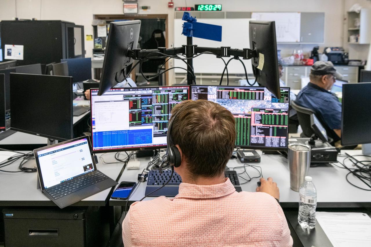 Test conductor, Lucas Tucker, monitors thermal vacuum testing operations in the Ocean Color Instrument (OCI) control room during the environmental test campaign. OCI is a highly advanced optical spectrometer that will be used to measure properties of light over portions of the electromagnetic spectrum. It will enable continuous measurement of light at finer wavelength resolution than previous NASA satellite sensors, extending key system ocean color data records for climate studies. OCI is PACE's (Plankton, Aerosol, Cloud, ocean Ecosystem) primary sensor built at Goddard Space Flight Center in Greenbelt, MD.