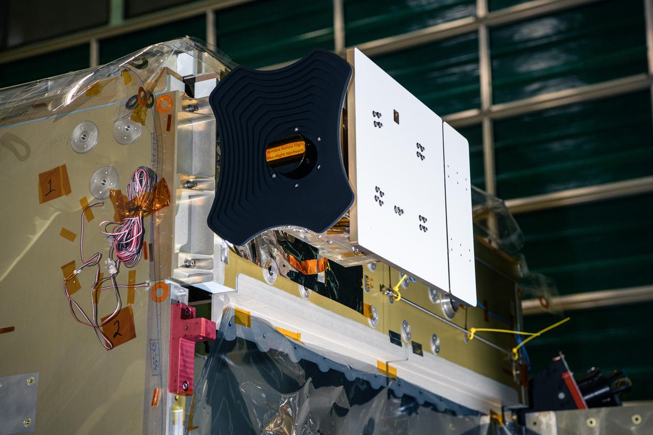 The Hyper-Angular Rainbow Polarimeter #2 (HARP2) instrument after integration to the Plankton, Aerosol, Cloud, ocean Ecosystem (PACE) spacecraft bus at NASA's Goddard Space Flight Center in Greenbelt, Maryland on October 25th, 2022. HARP2 is one of three instruments on NASA's PACE observatory, it was designed and built by UMBC's Earth and Space Institute. PACE's unprecedented spectral coverage will provide the first-ever global measurements designed to identify phytoplankton community composition. The mission will make global ocean color measurements, using the Ocean Color Instrument (OCI), to provide extended data records on ocean ecology and global biogeochemistry along with polarimetry measurements, using the Spectro-polarimeter for Planetary Exploration (SPEXone) and the Hyper Angular Research Polarimeter (HARP2) to provide extended data records on clouds and aerosols. The Earth-observing satellite mission, built at Goddard Space Flight Center in Greenbelt, MD, will continue and advance observations of global ocean color, biogeochemistry, and ecology, as well as the carbon cycle, aerosols and clouds.