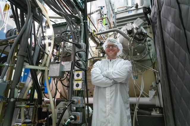 NASA image: OCI Technician Monitors the Thermal Vacuum Chamber